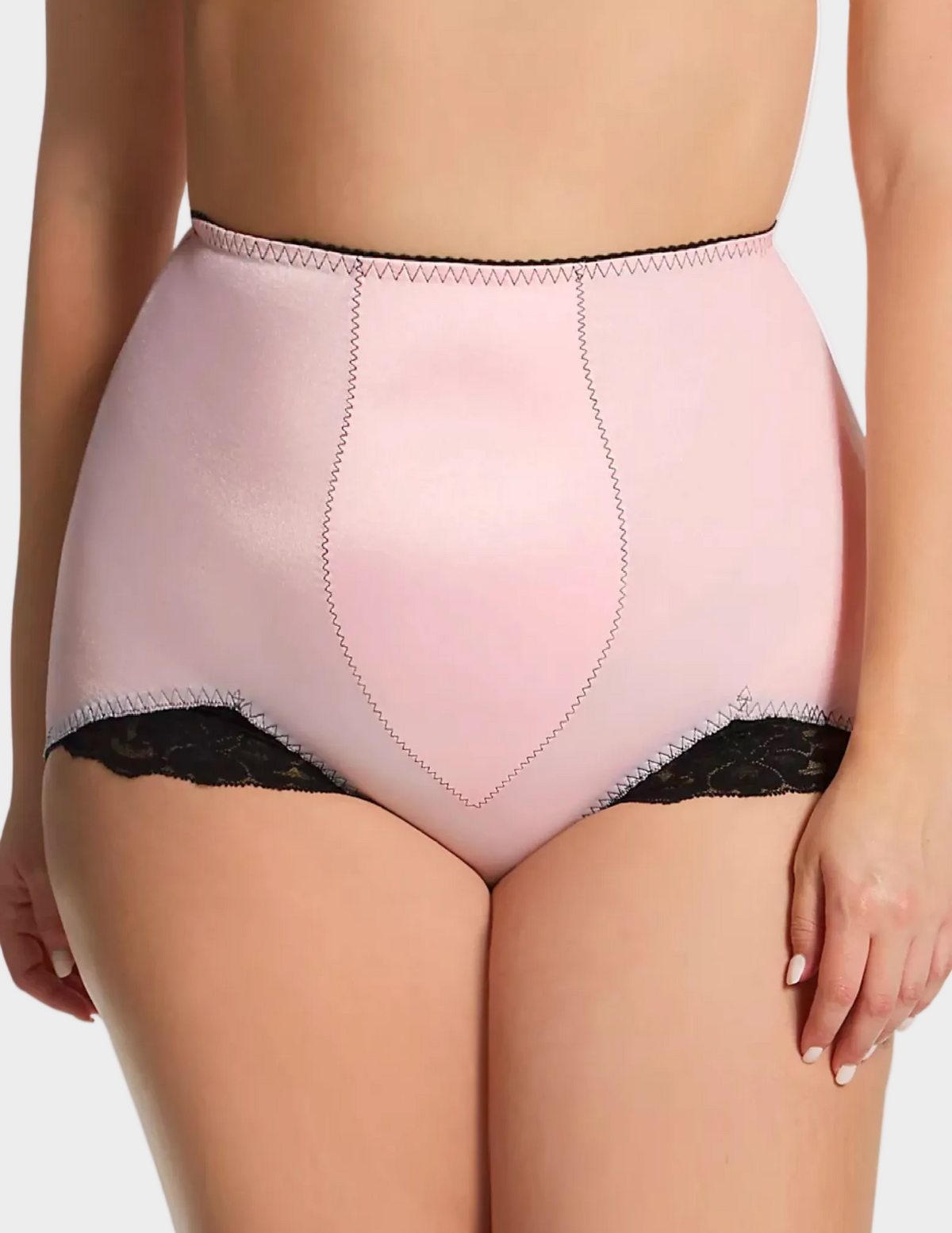 Front view of a curvy model wearing Rago 919 pink shaping panty
