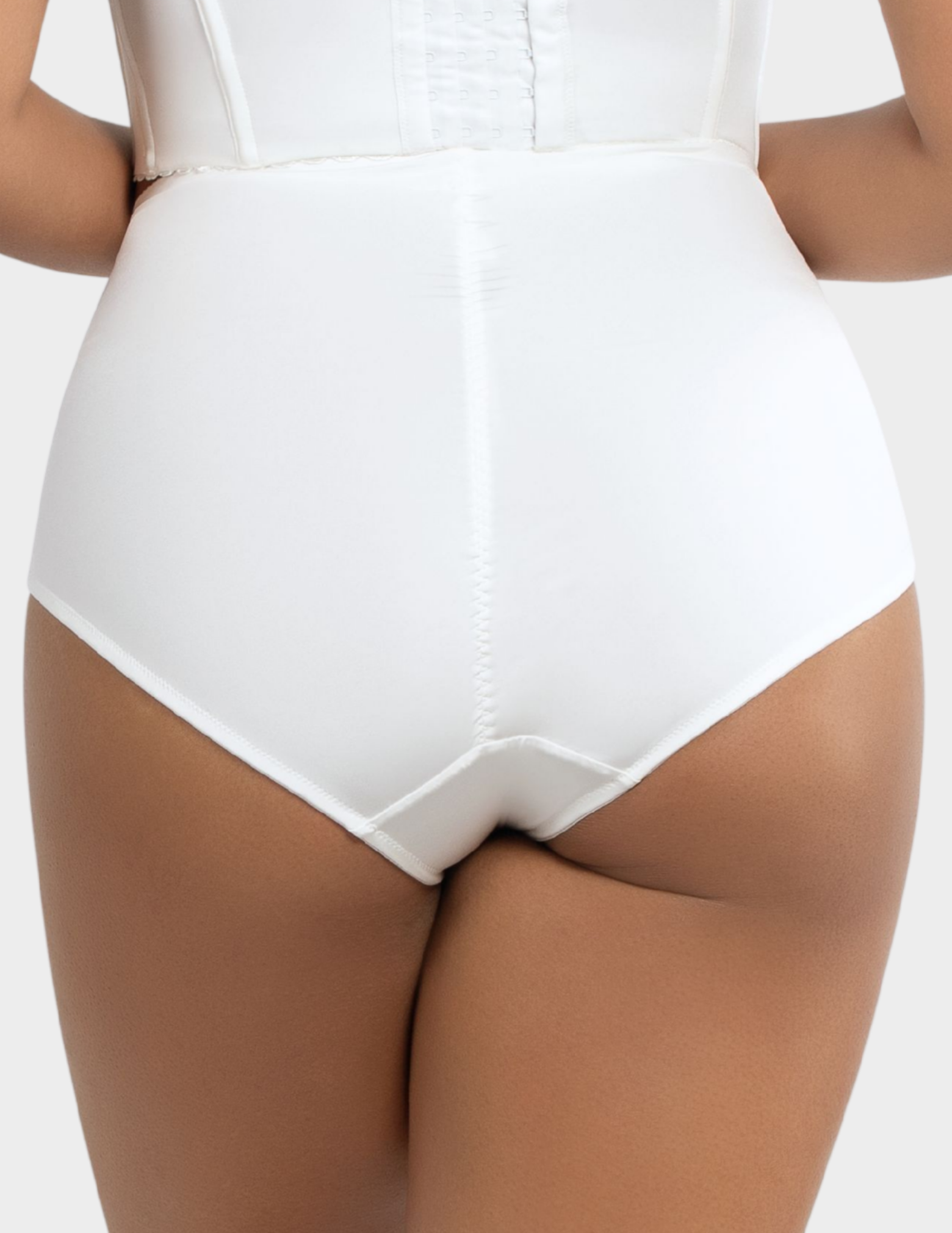 Back view of a model wearing Parfait Casey high waist panty in Pearl White