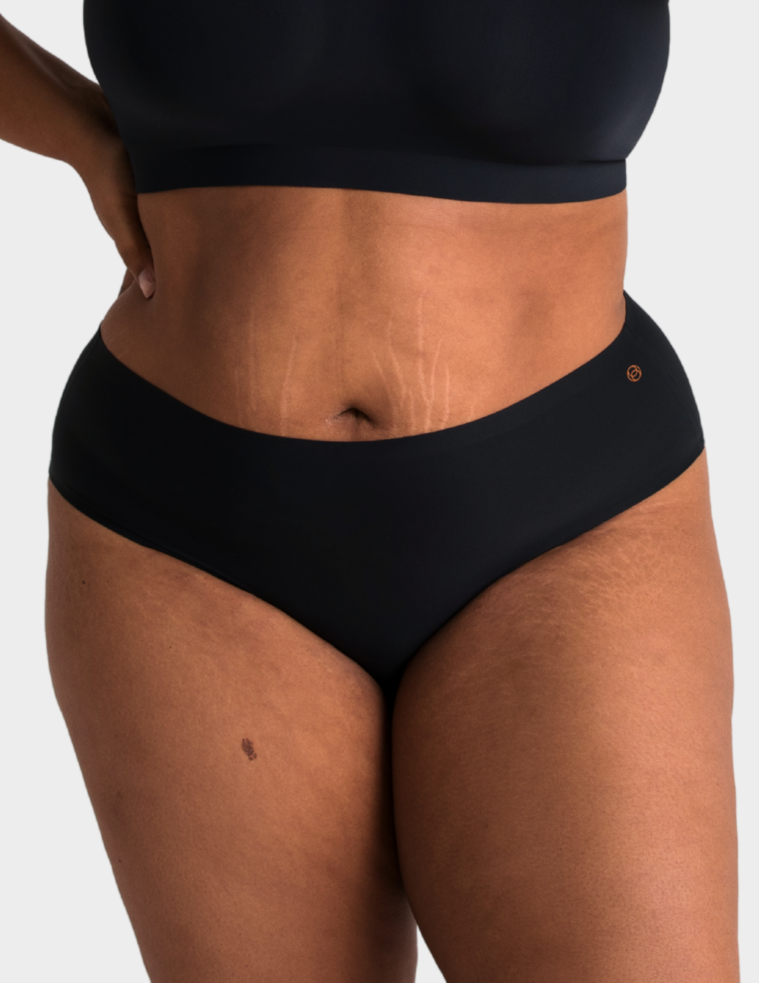 Front view of a model wearing Evelyn & Bobbie high waist brief in Black