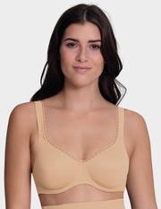Front view of a model wearing an Anita Twin Firm bra in color Deep Sand
