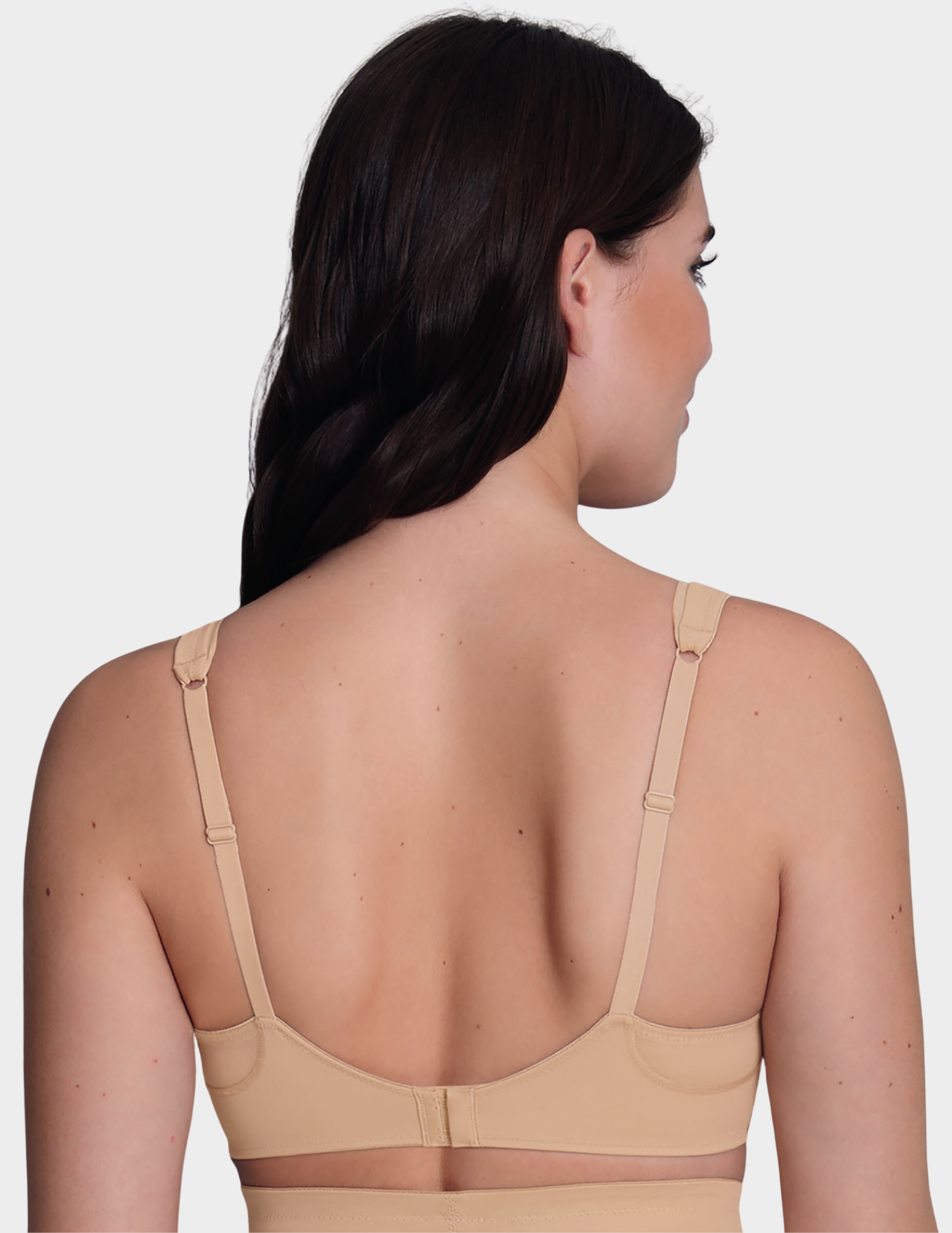 Back view of a model wearing an Anita Twin Firm bra in color Deep Sand