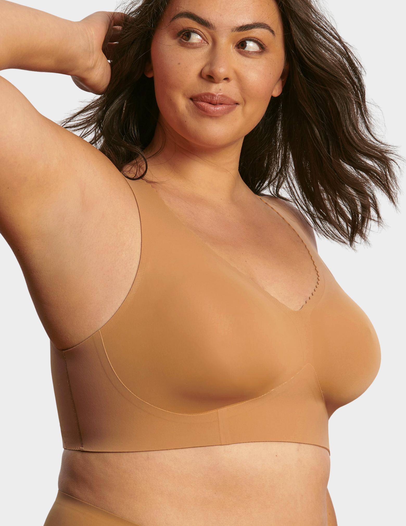 Side view of a model wearing Evelyn & Bobbie Evelyn Bra in Mica