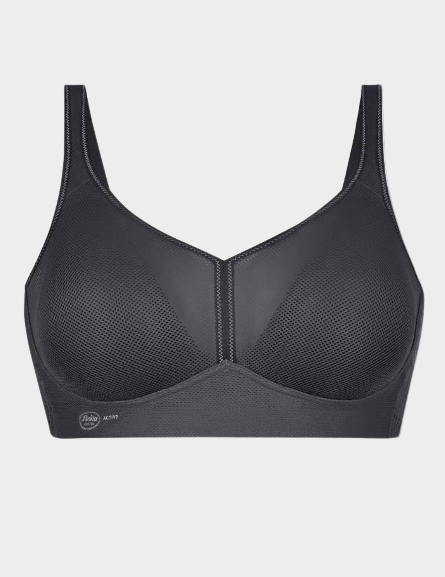 Dark grey sports bra on a light gray background