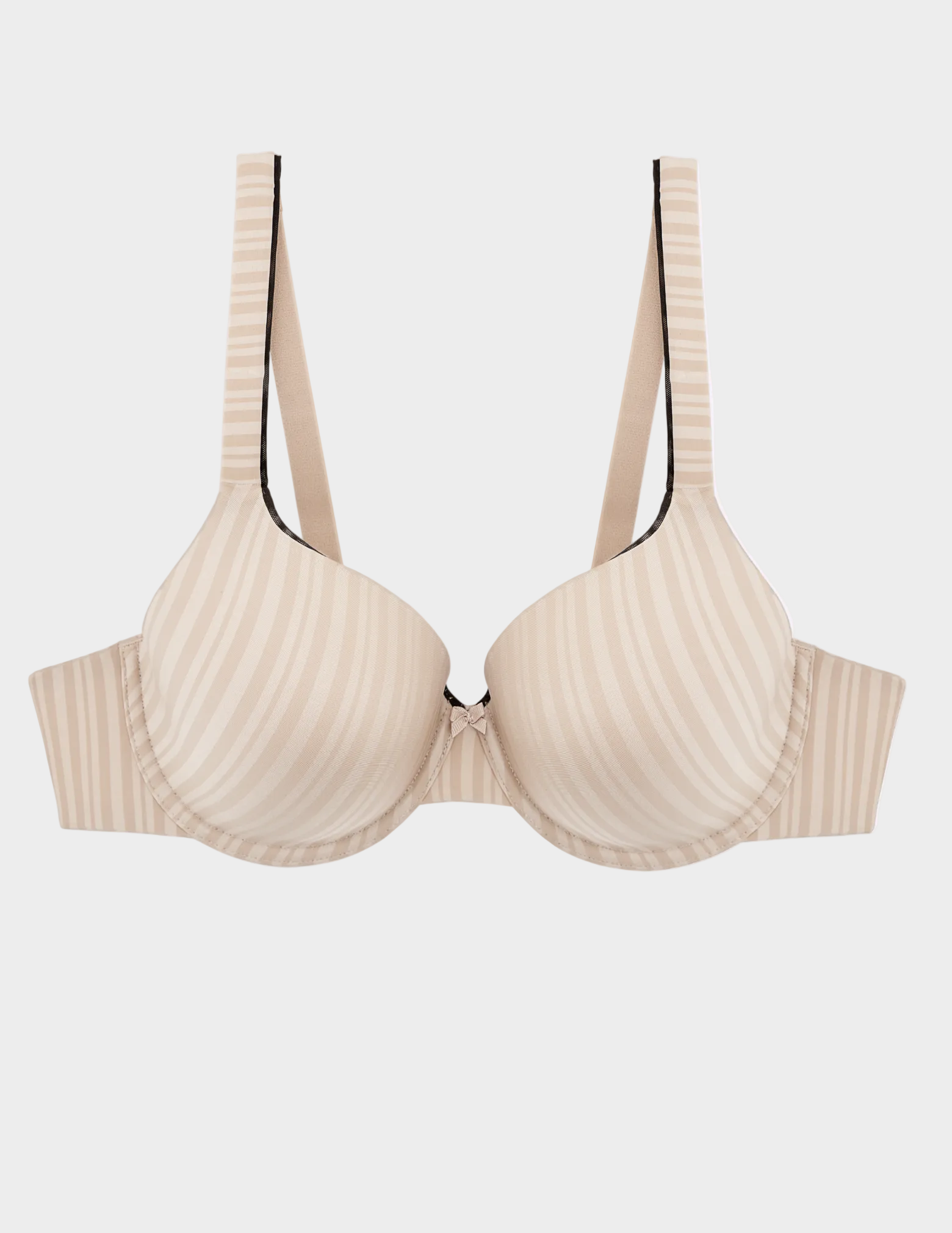 Flat lay of beige and black Aline t-shirt bra on a white background