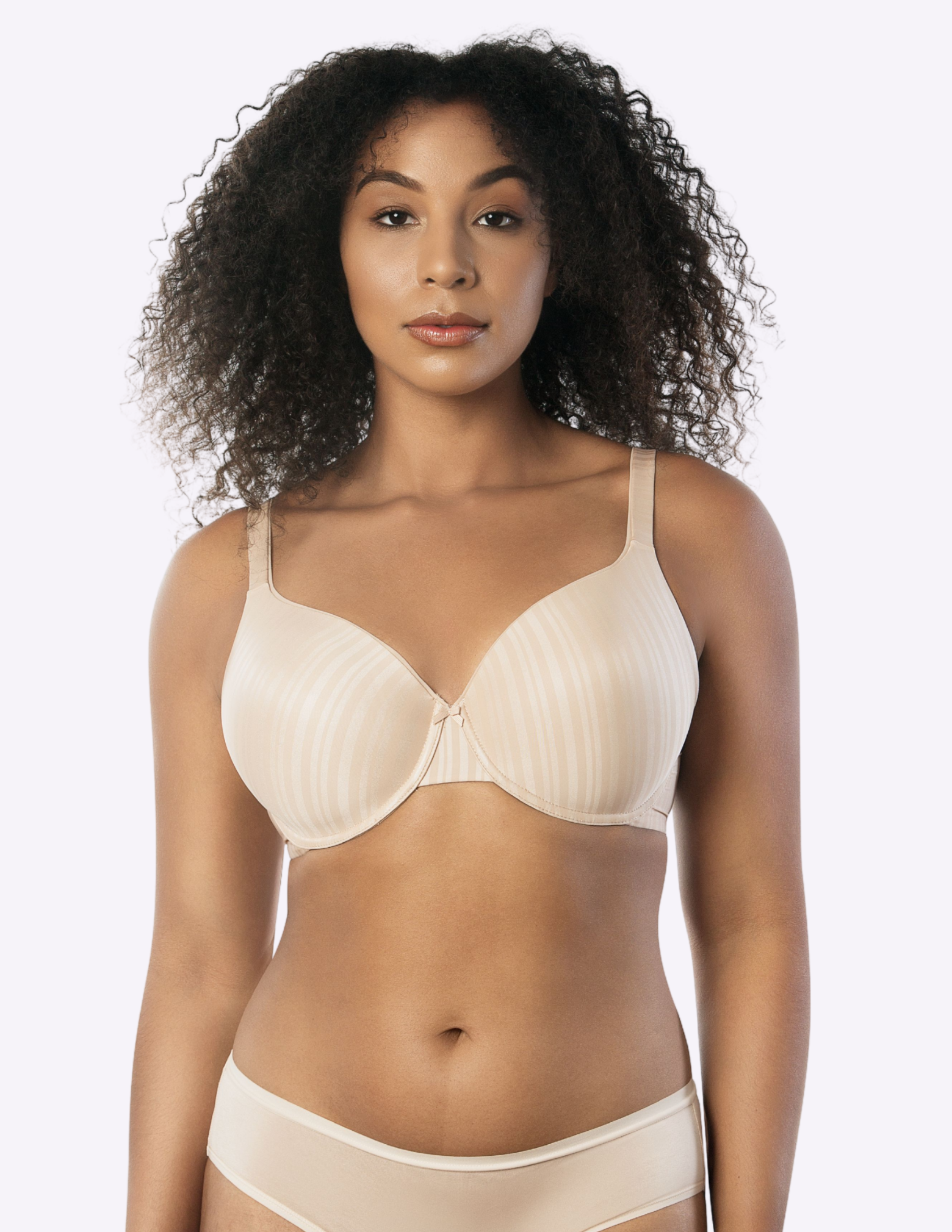 Front view of a model wearing beige Aline t-shirt bra