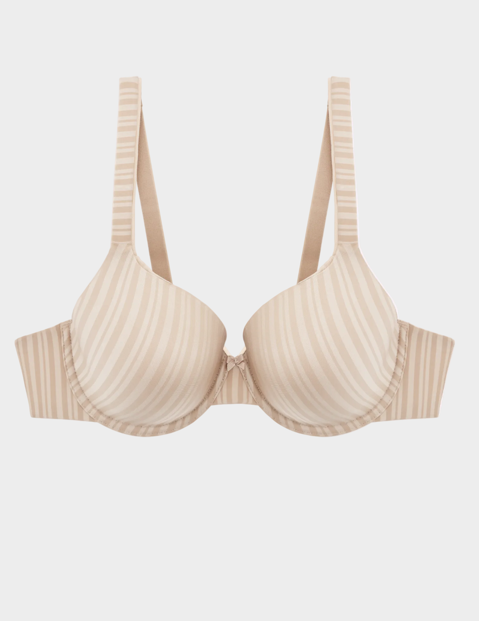 Flat lay of beige Aline t-shirt bra on a white background