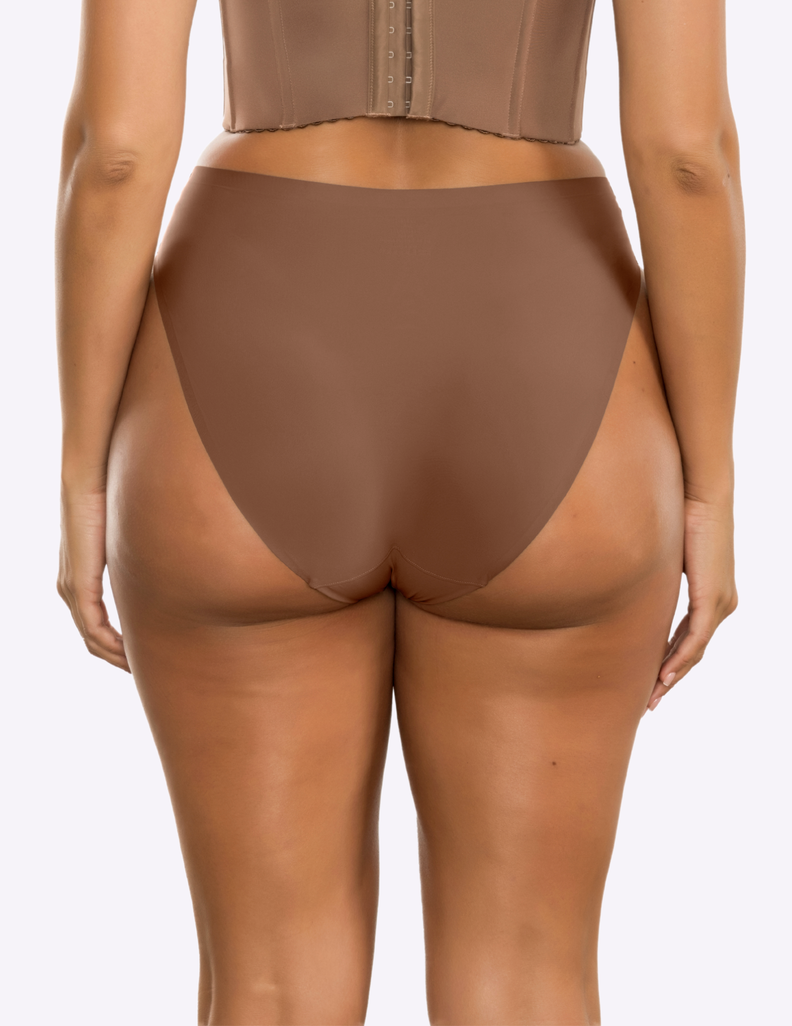 Back view of a model wearing bonded panty in mid nude