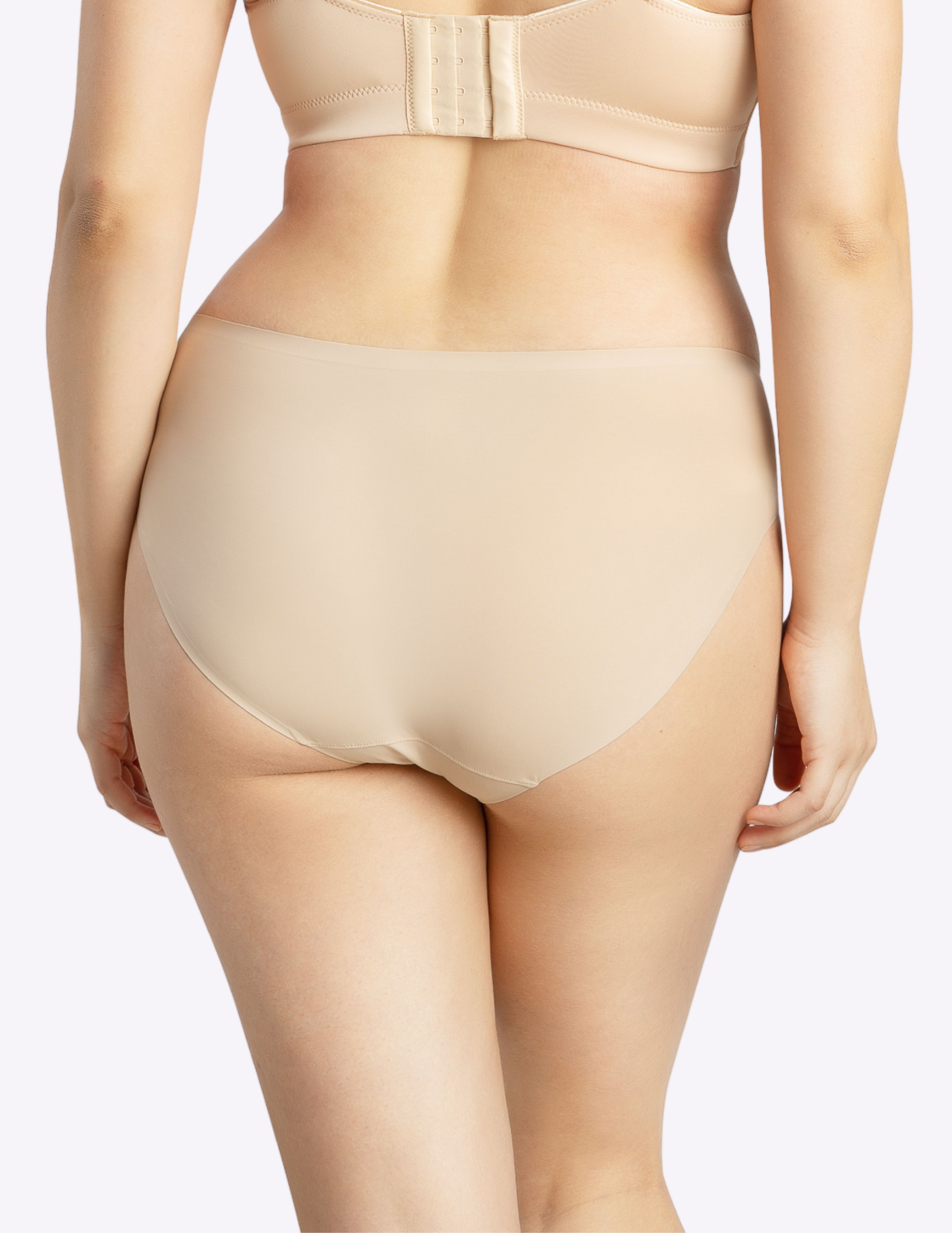 Back view of a model wearing bonded panty in european nude