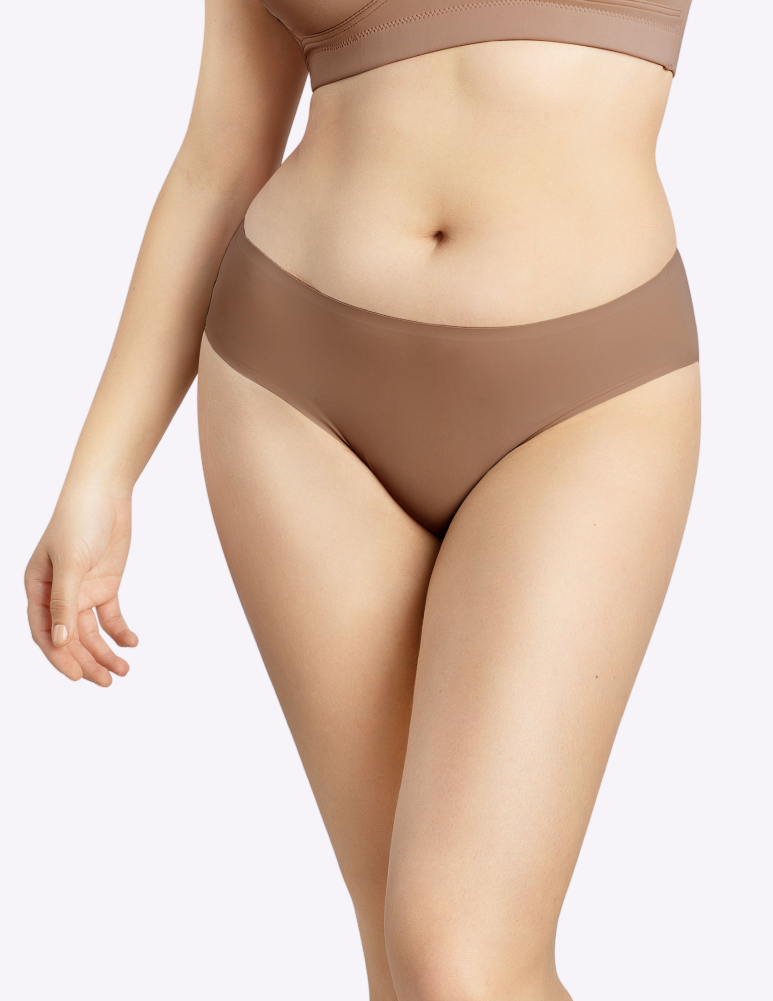 Front view of a model wearing bonded panty in mid nude