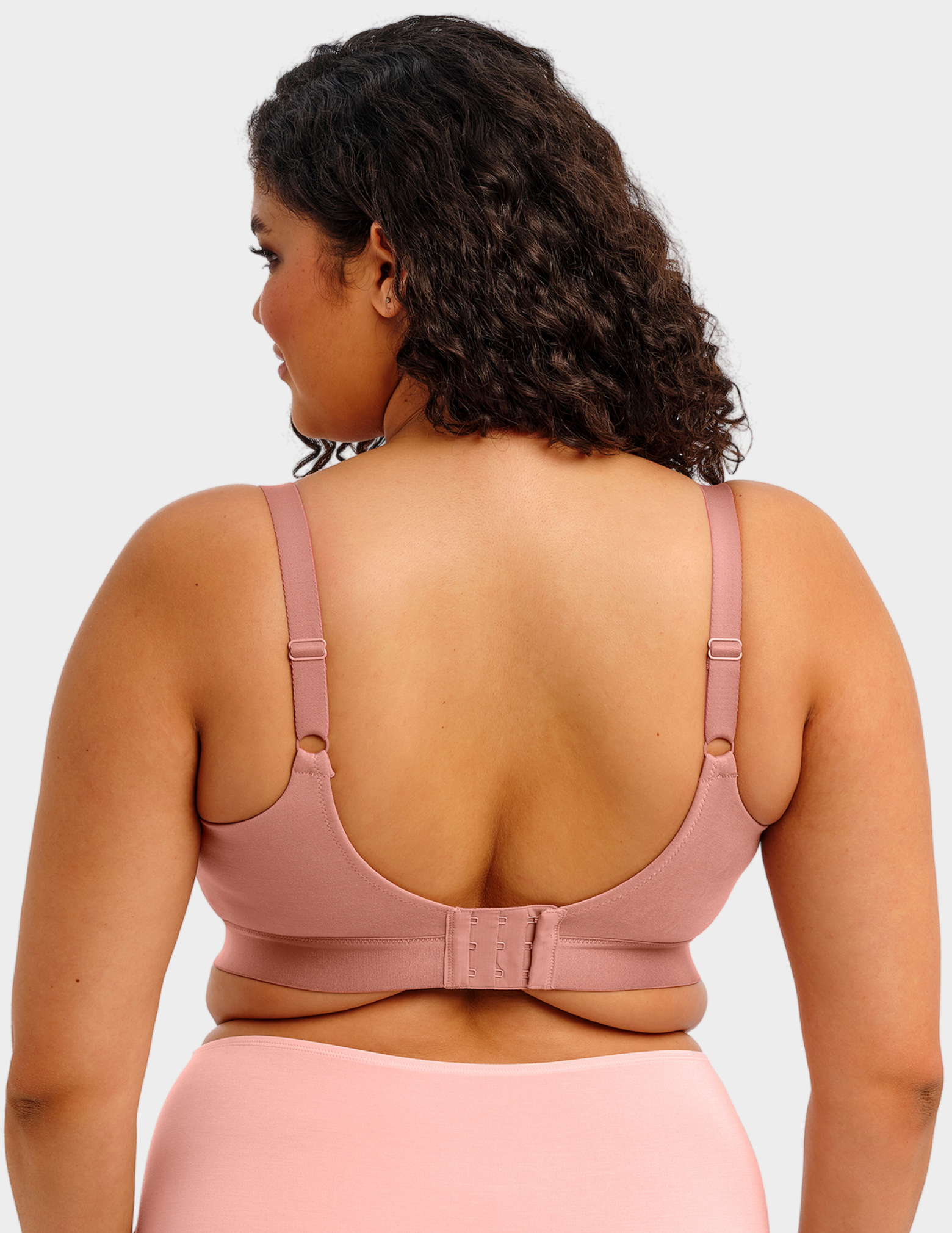 Back view of a model wearing Elomi Downtime bralette in Ash Rose