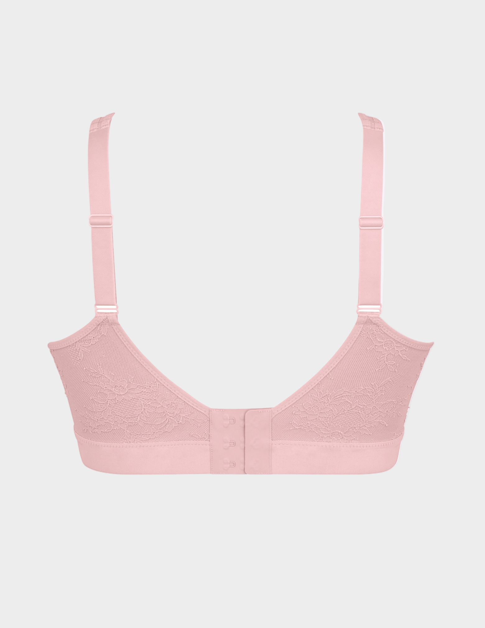Pink bra on a light grey background