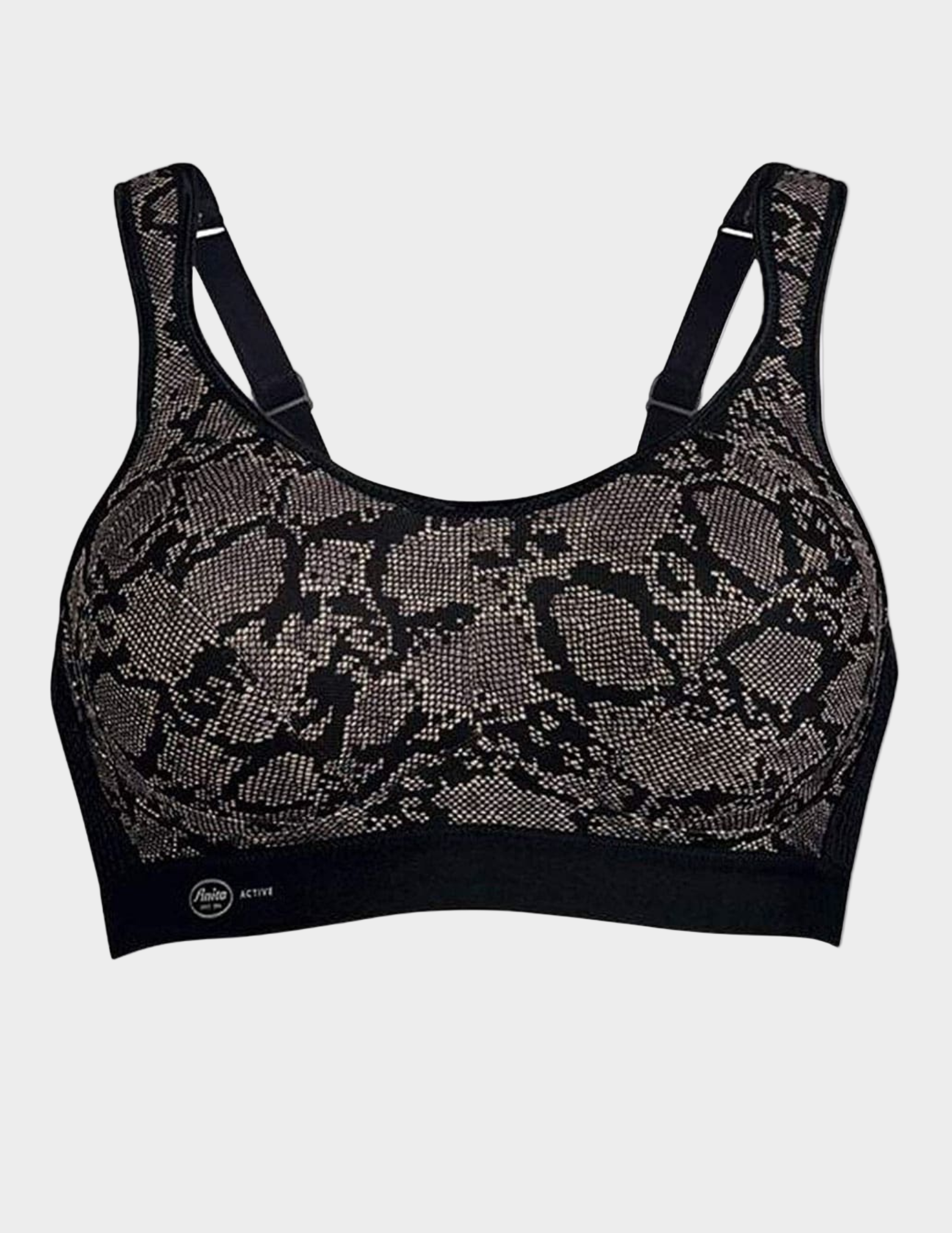 Grey snakeskin print sports bra on a white background