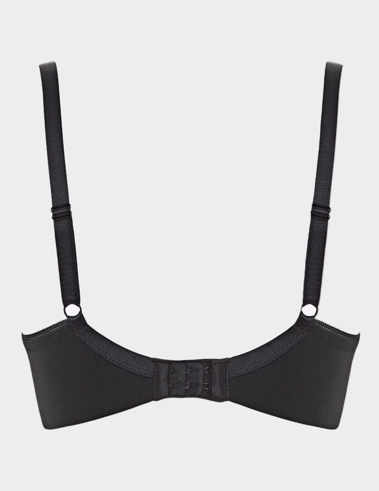 back view of black bra on white background