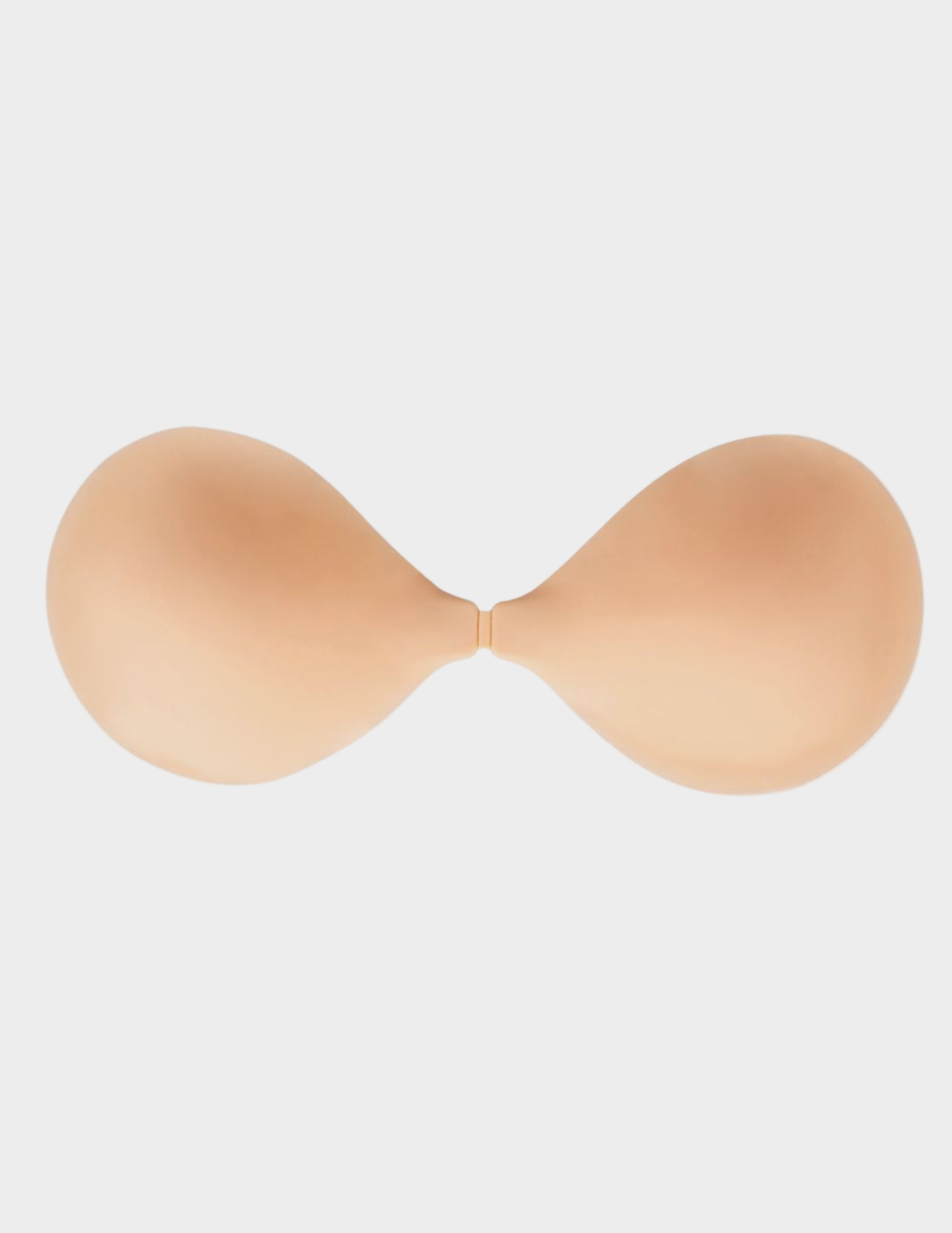 beige backless front close sticky bra on white background
