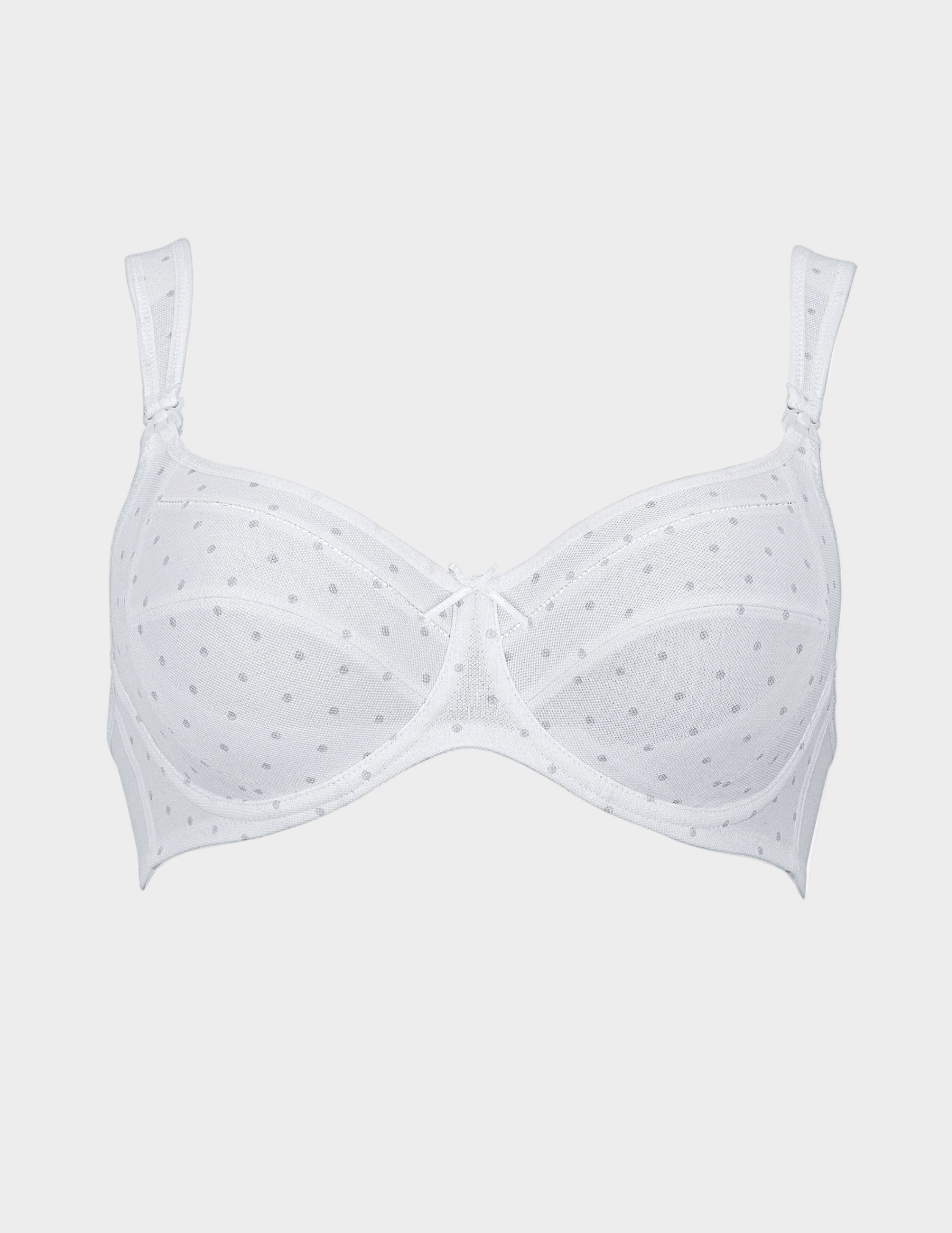 White nursing bra with subtle polka dot pattern