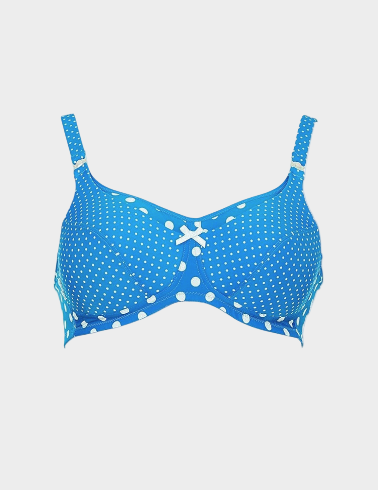 Blue polka dot nursing bra on a light blue background