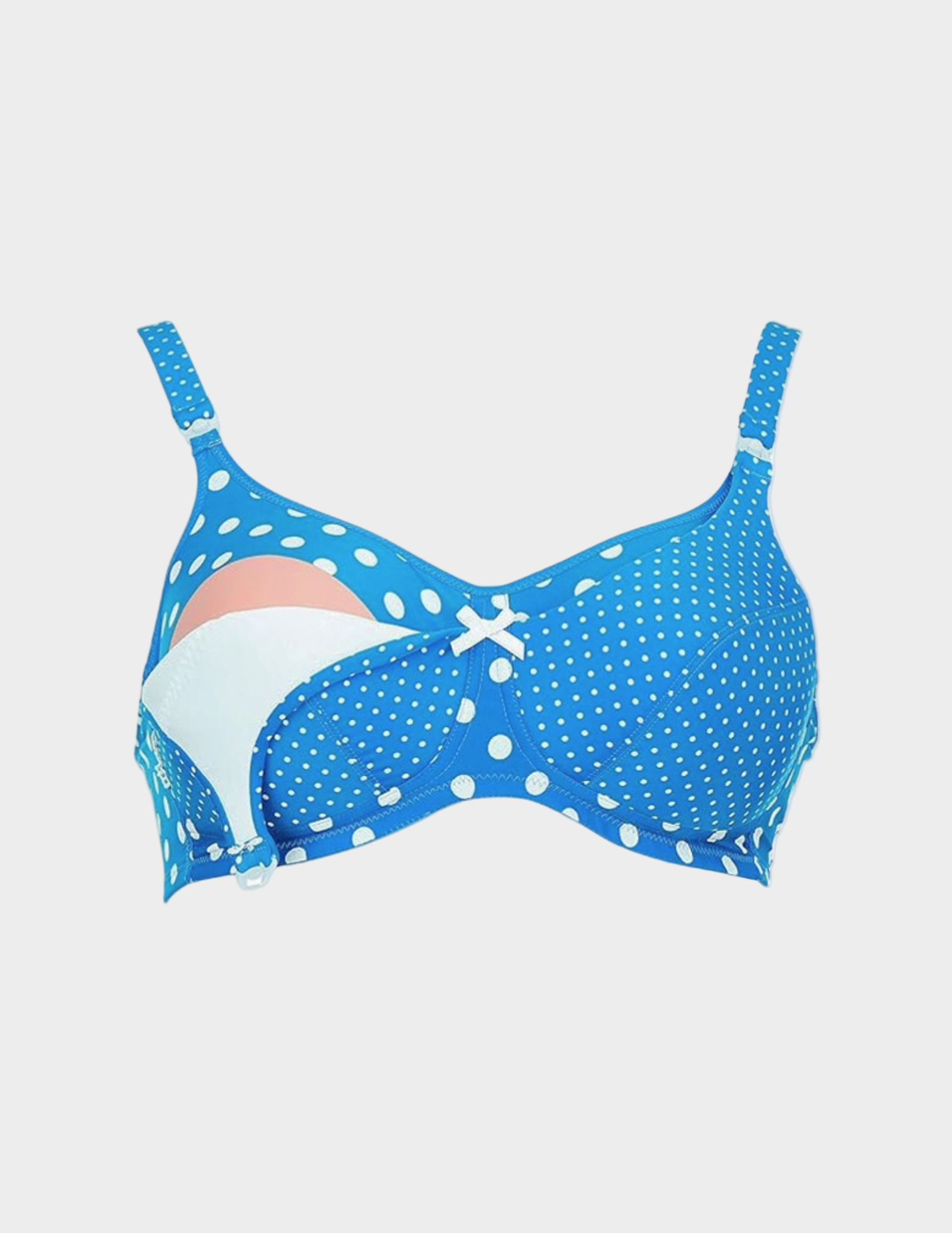 Blue nursing bra with white polka dots on a white background