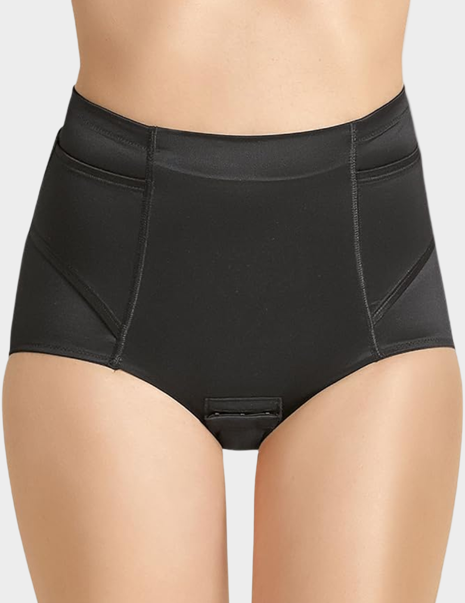 Black high-waisted underwear on a neutral background