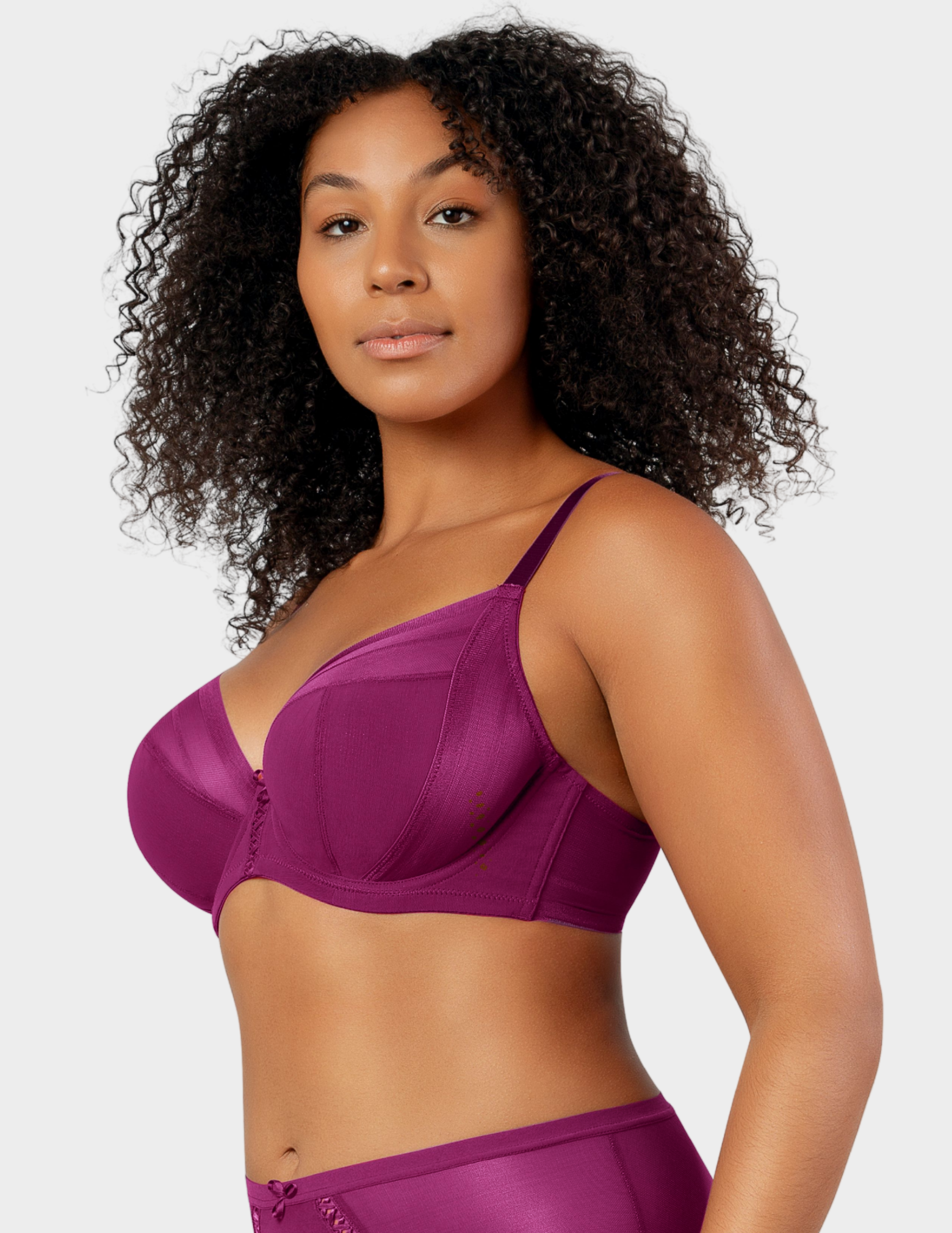 Side view of a model wearing Parfait Shea plunge bra in blackberry