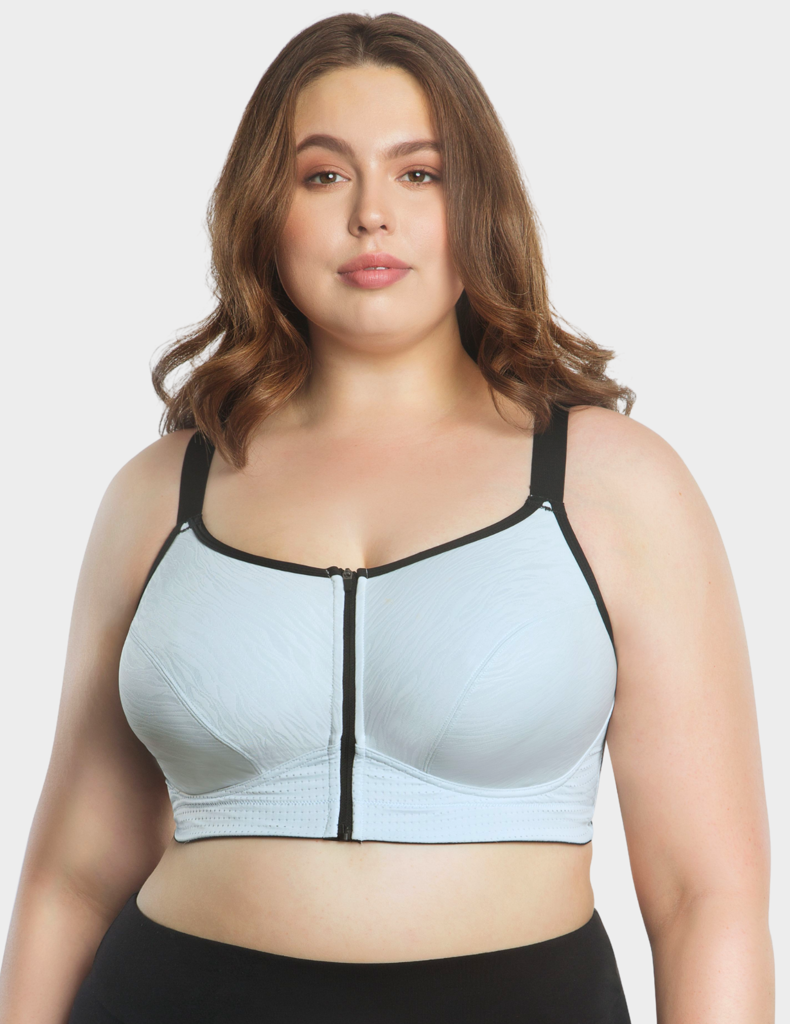Front view of a model wearing Parfait Wave sports bra in Silver