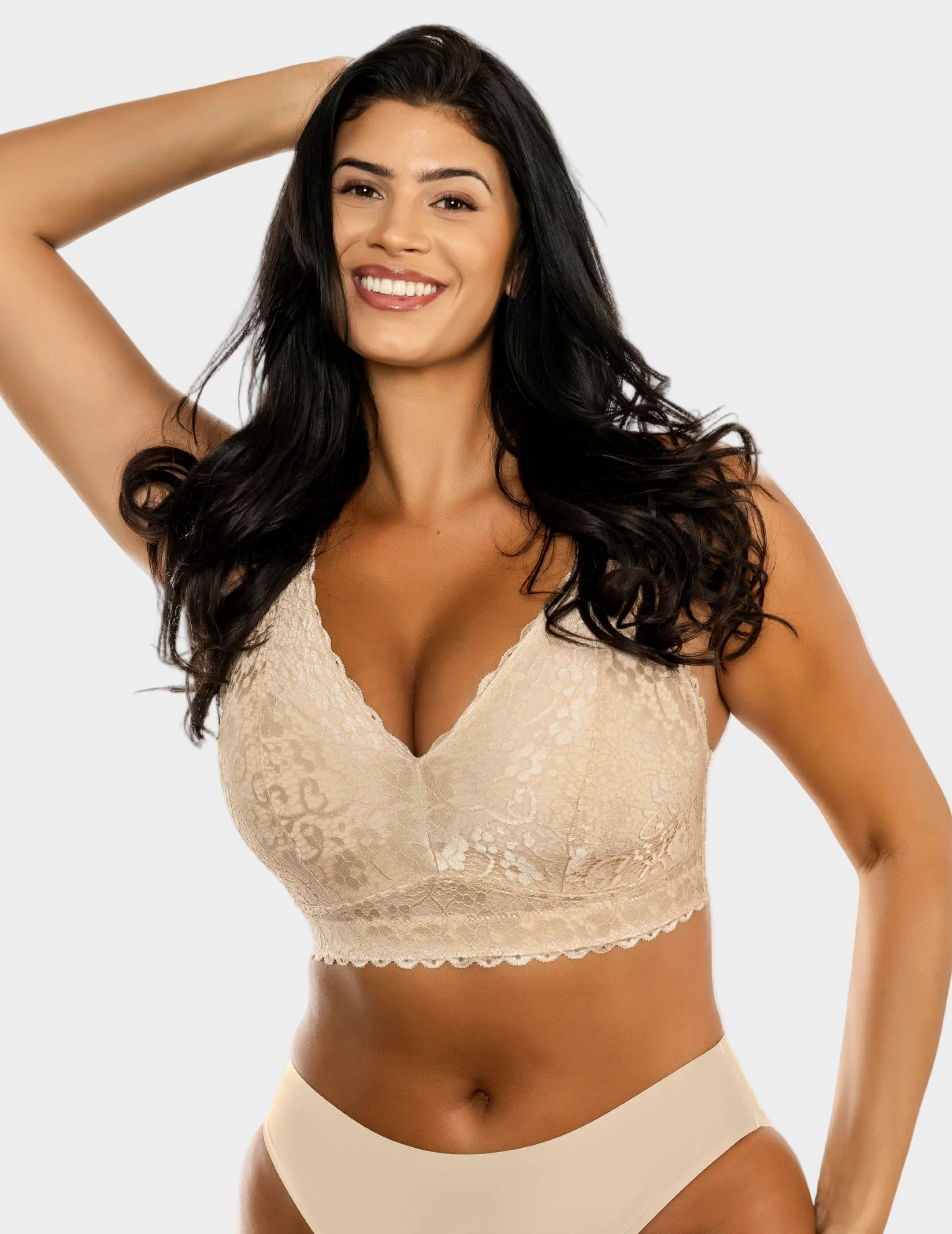 Front view of a model wearing beige Adriana lace bralette