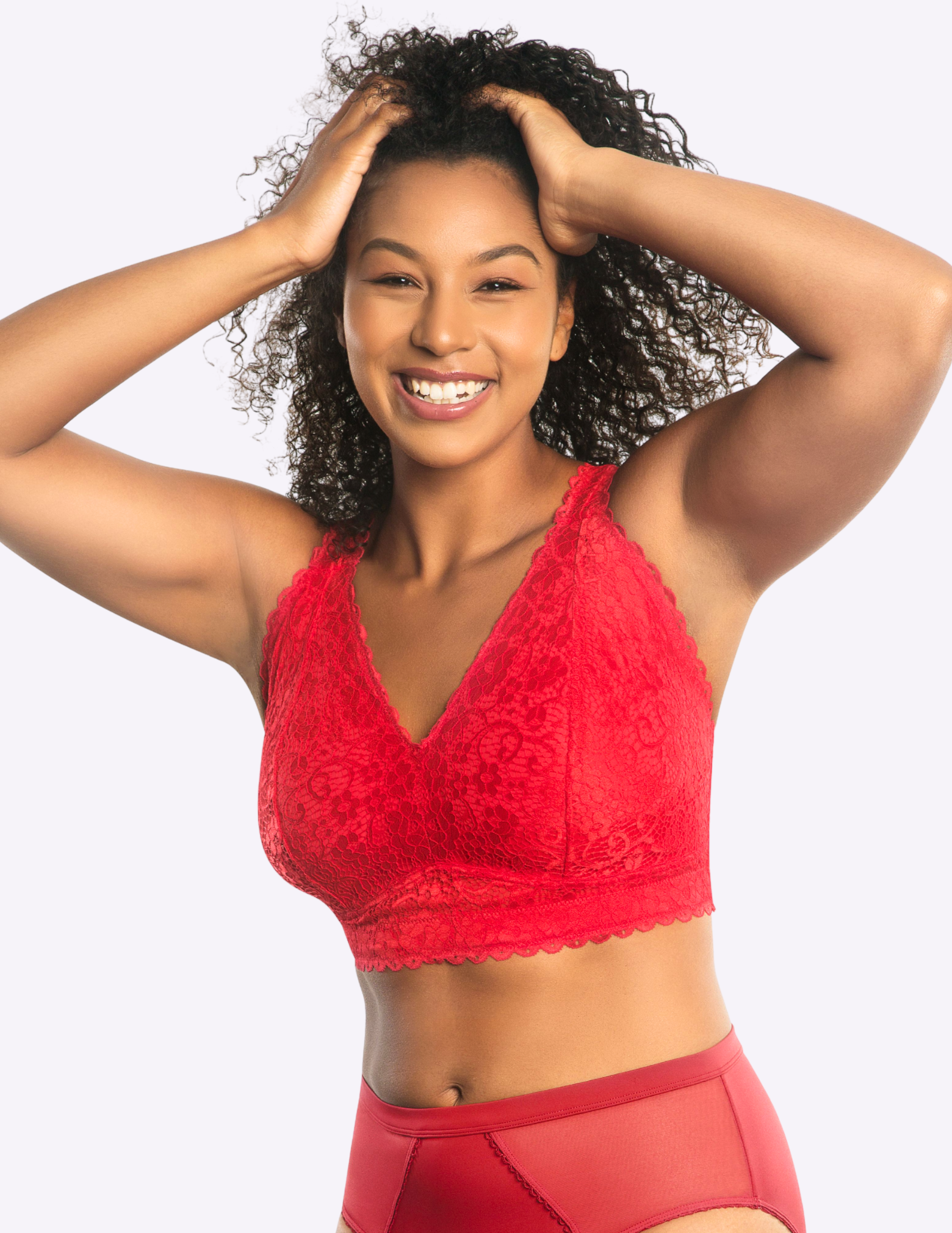 Front view of a model wearing red Adriana lace bralette