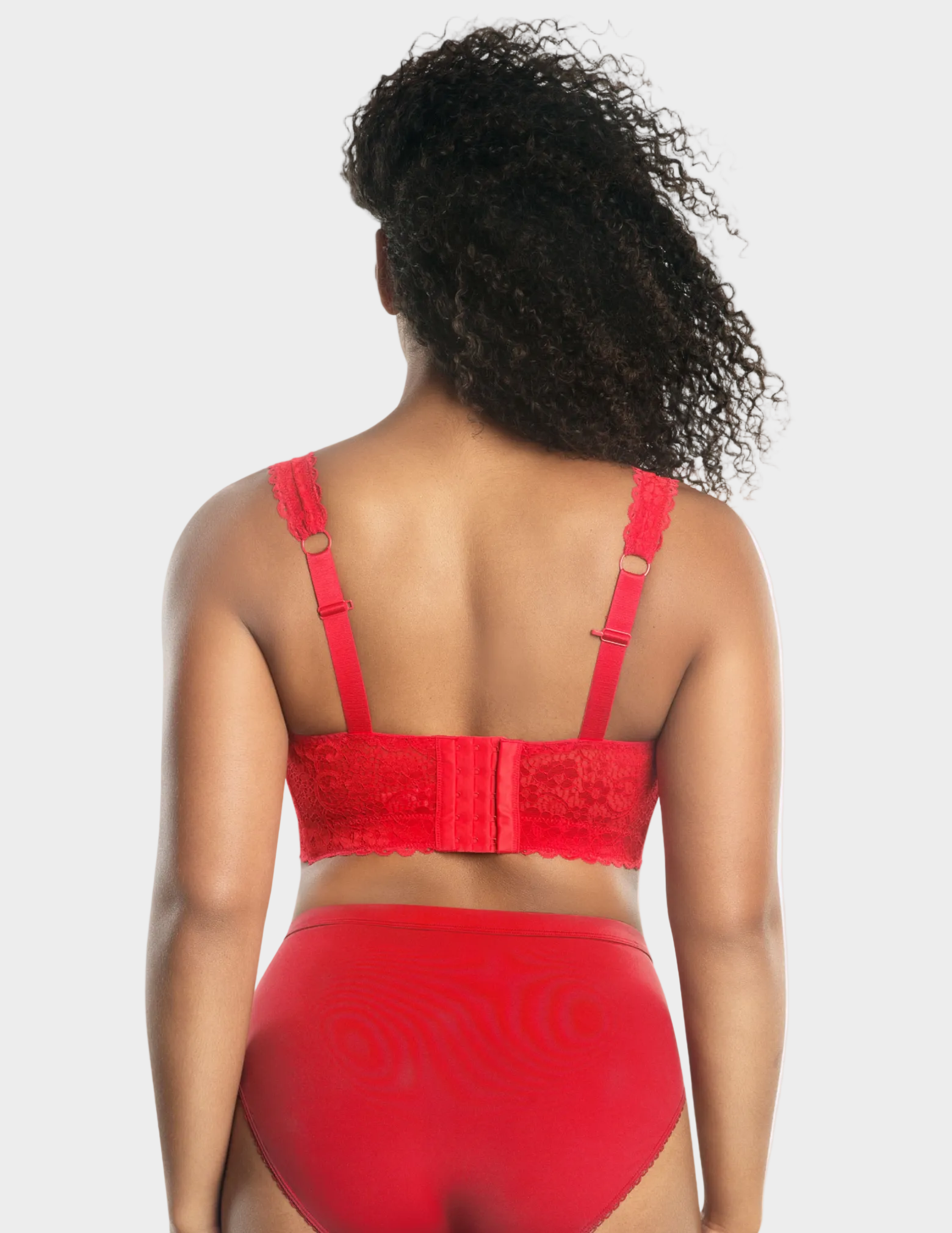 Back view of a model wearing red Adriana lace bralette