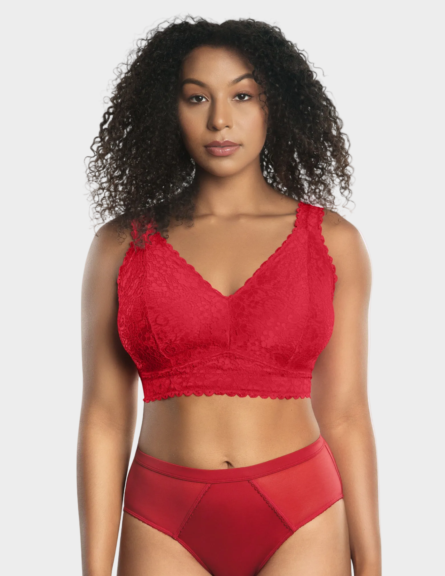 Front view of a model wearing red Adriana lace bralette