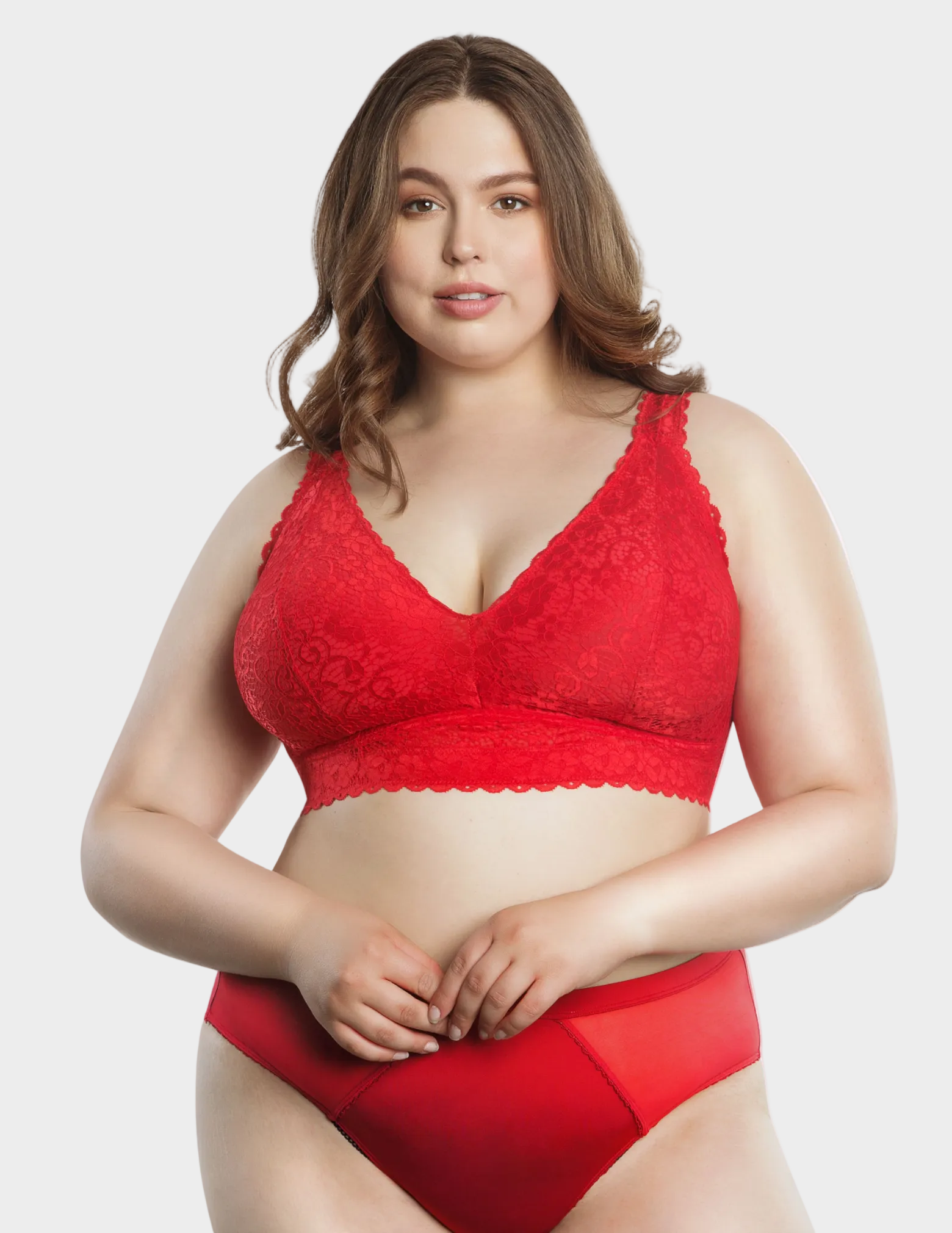 Front view of a curvy model wearing red Adriana lace bralette