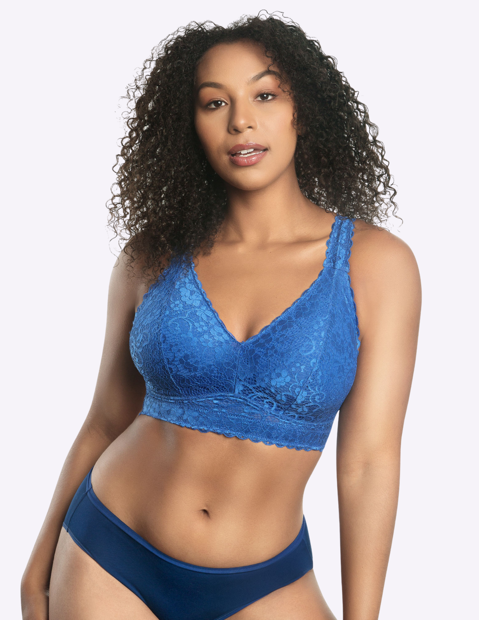 Front view of a model wearing blue Adriana lace bralette