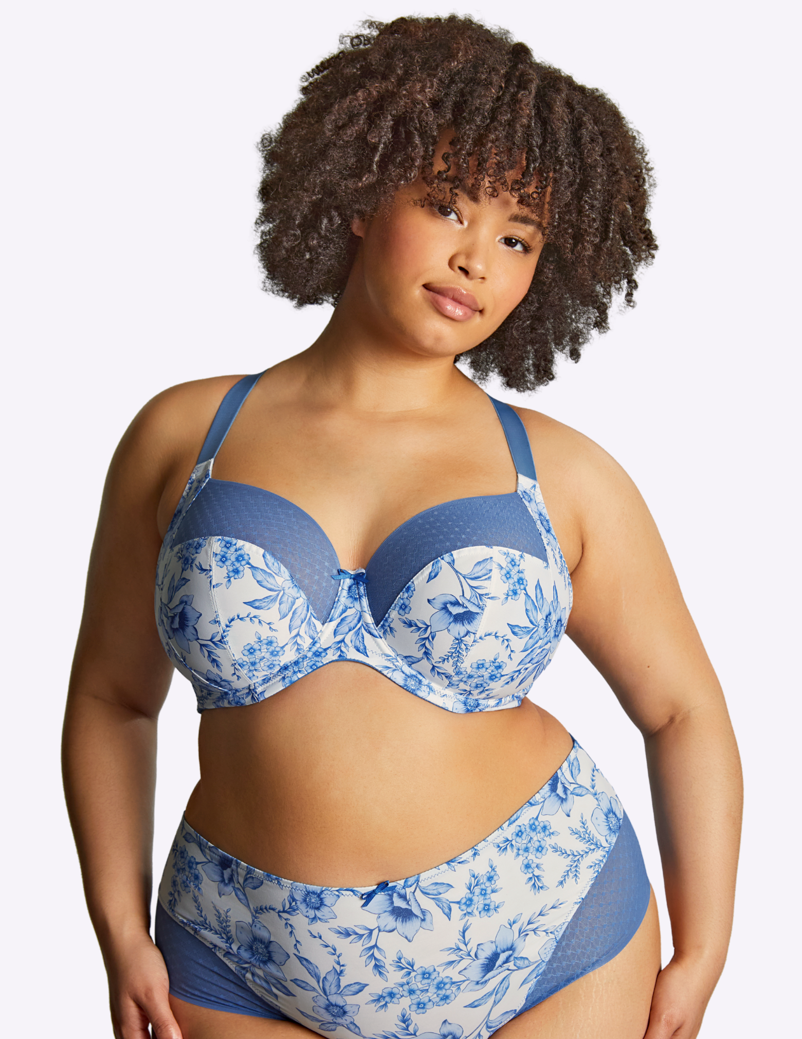 Front view of model wearing bliss bra in blue floral