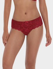 Woman wearing red lace underwear on a white background