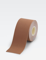 roll of brown body tape on white background