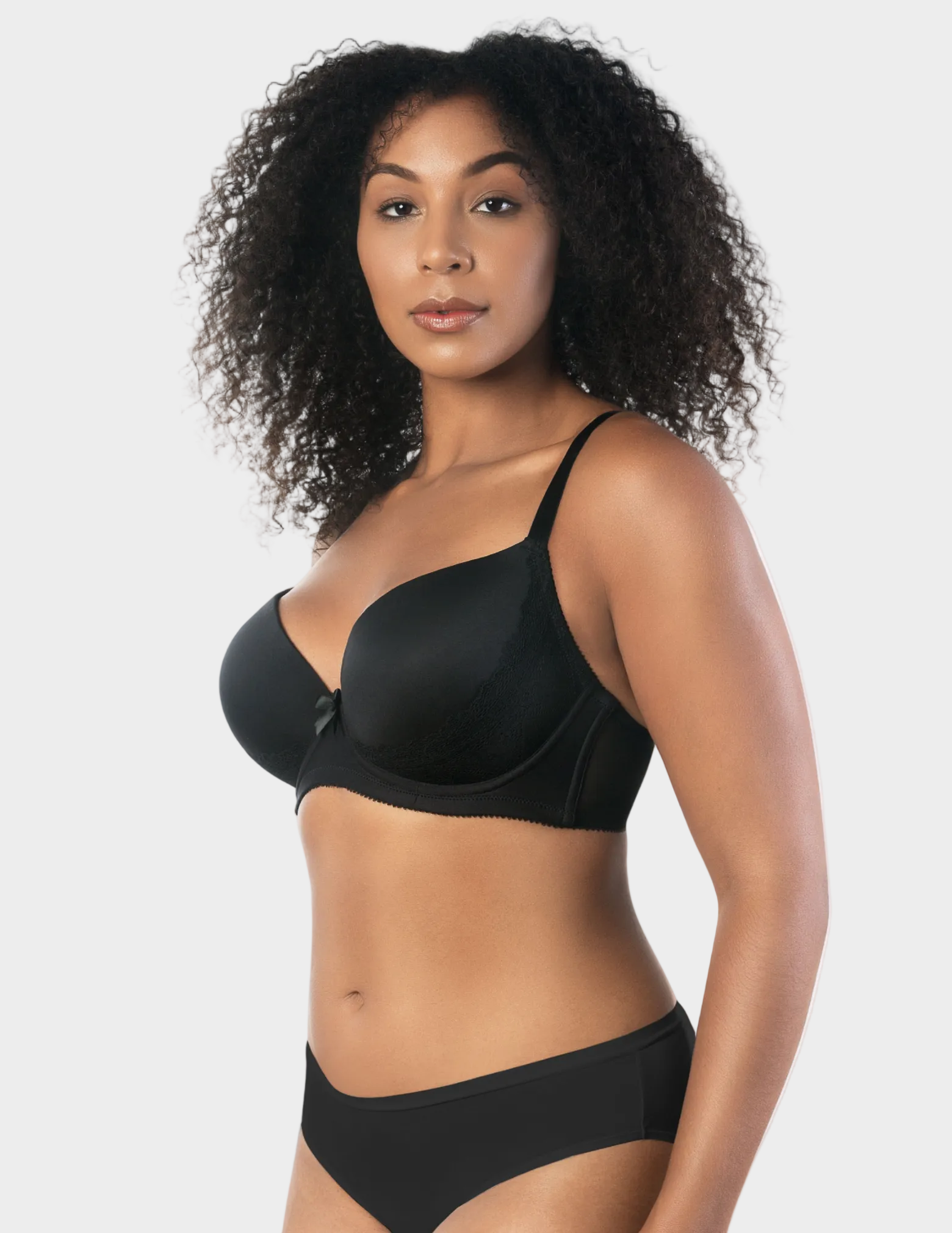 Side view of a model wearing Casey plunge t-shirt bra in Black 