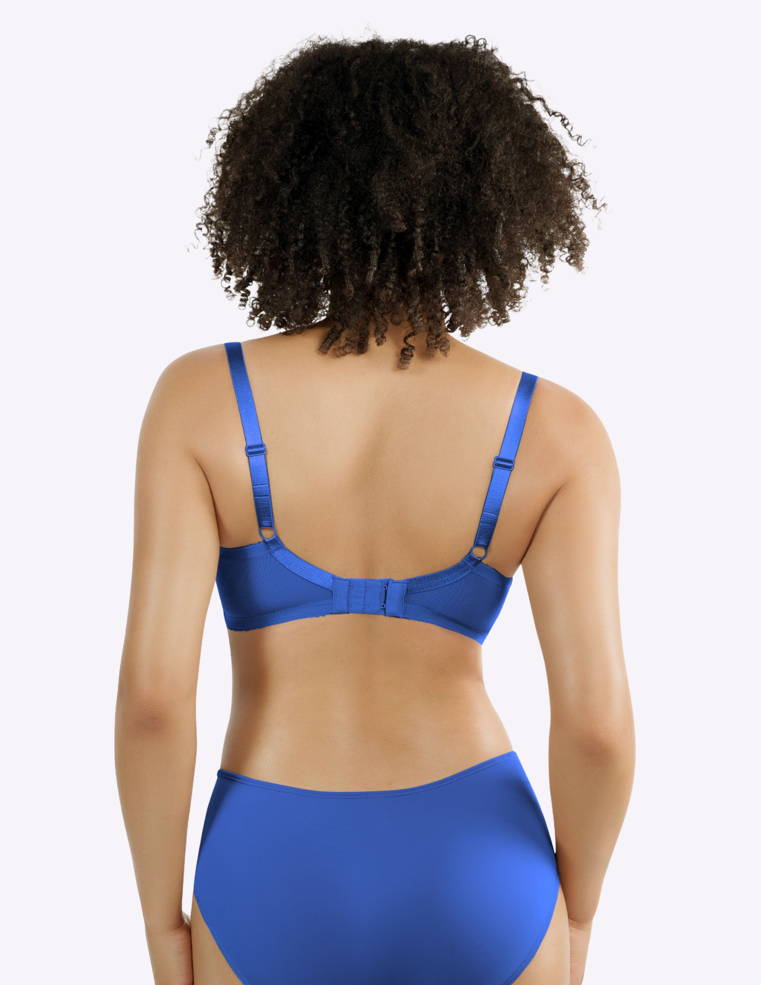 Back view of a model wearing Casey plunge t-shirt bra in Nautical Blue