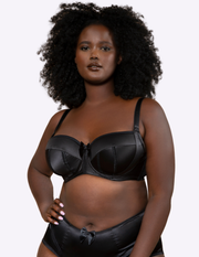 Front view of a model wearing Charlotte padded balconette bra in black