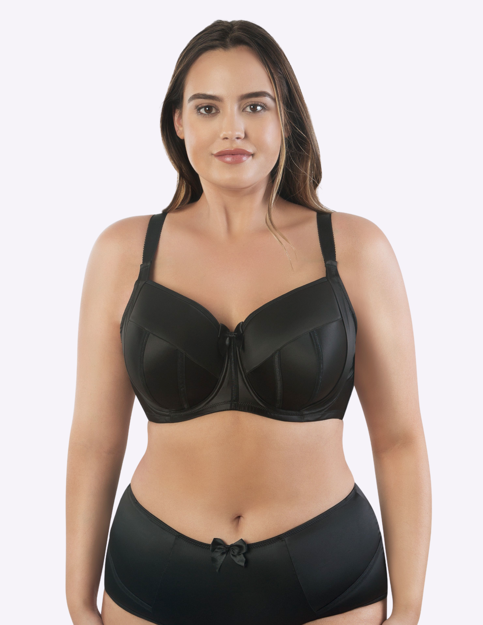 Front view of a curvy model wearing Charlotte padded balconette bra in black