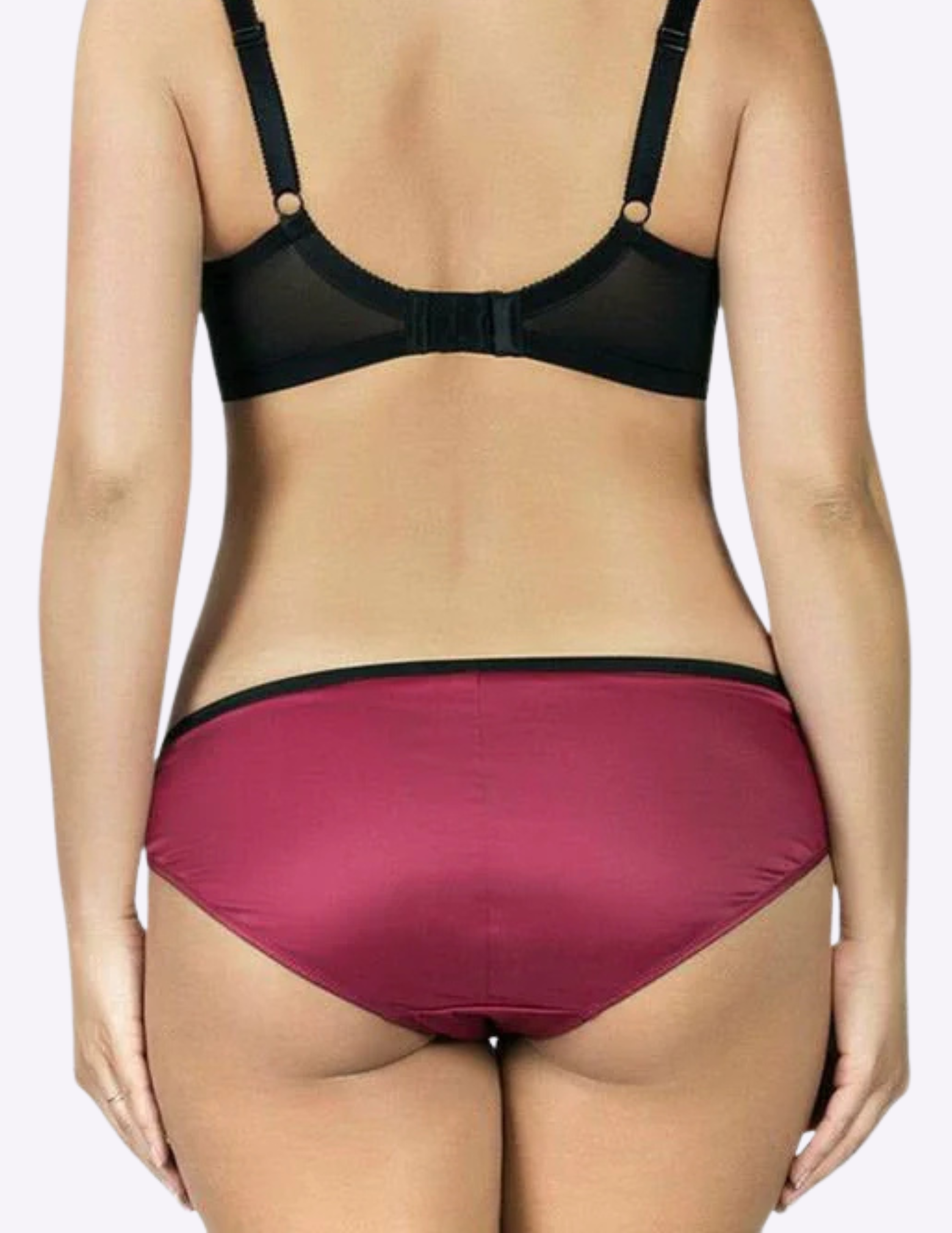 Back view of a model wearing Charlotte low rise bikini panty in Rio Red