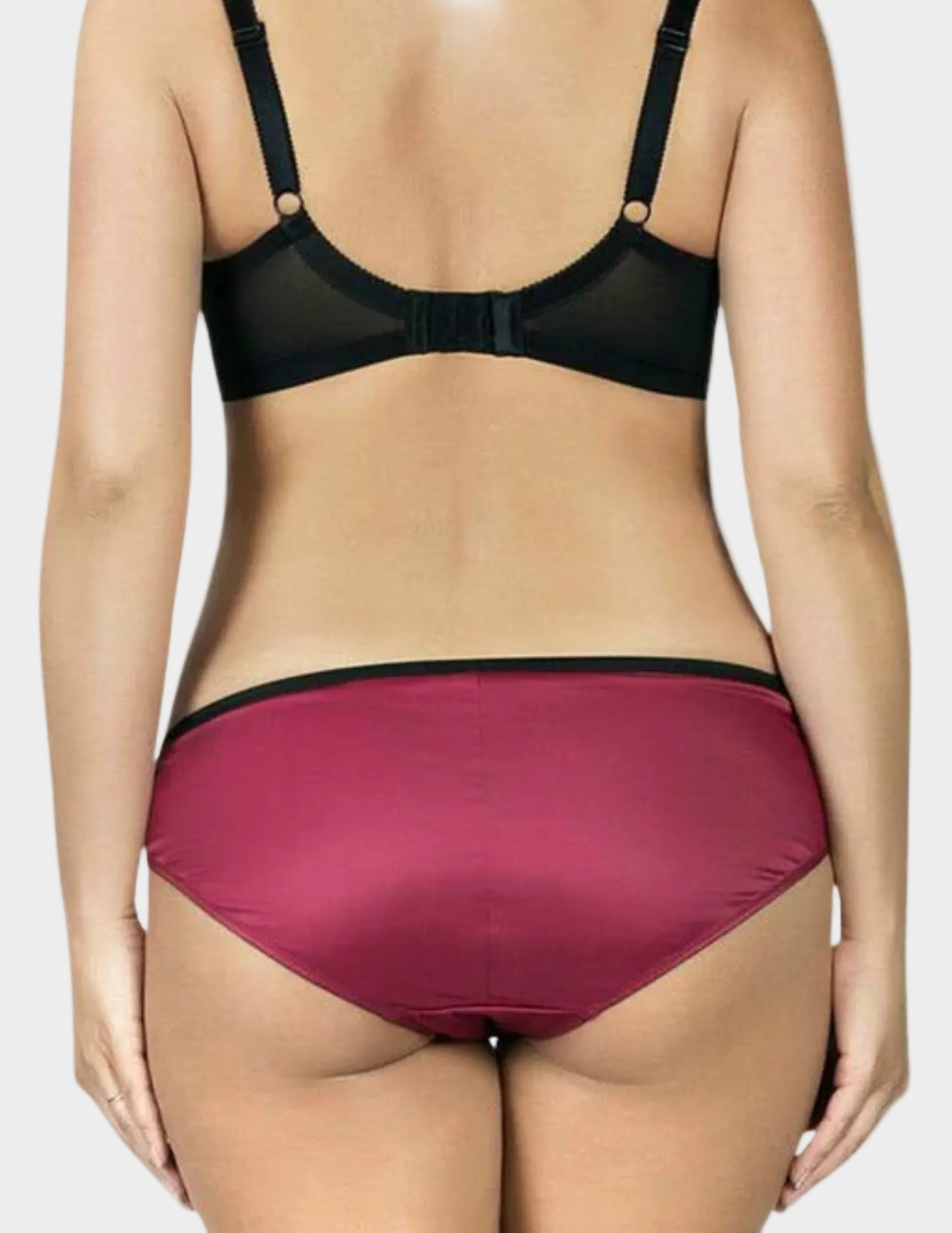 Back view of a model wearing Charlotte low rise bikini panty in Rio Red