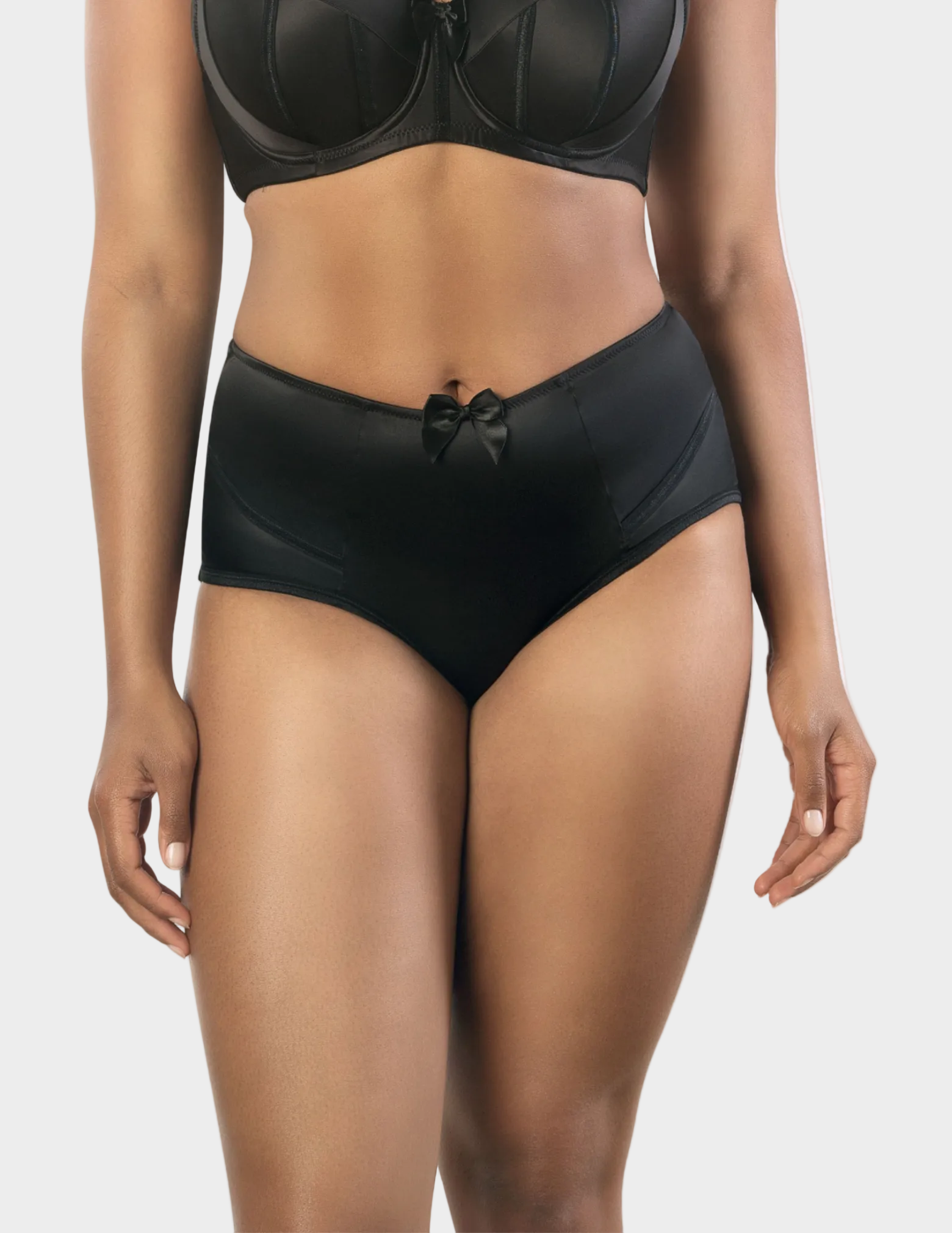 Front view of a model wearing Charlotte high waisted panty in Black