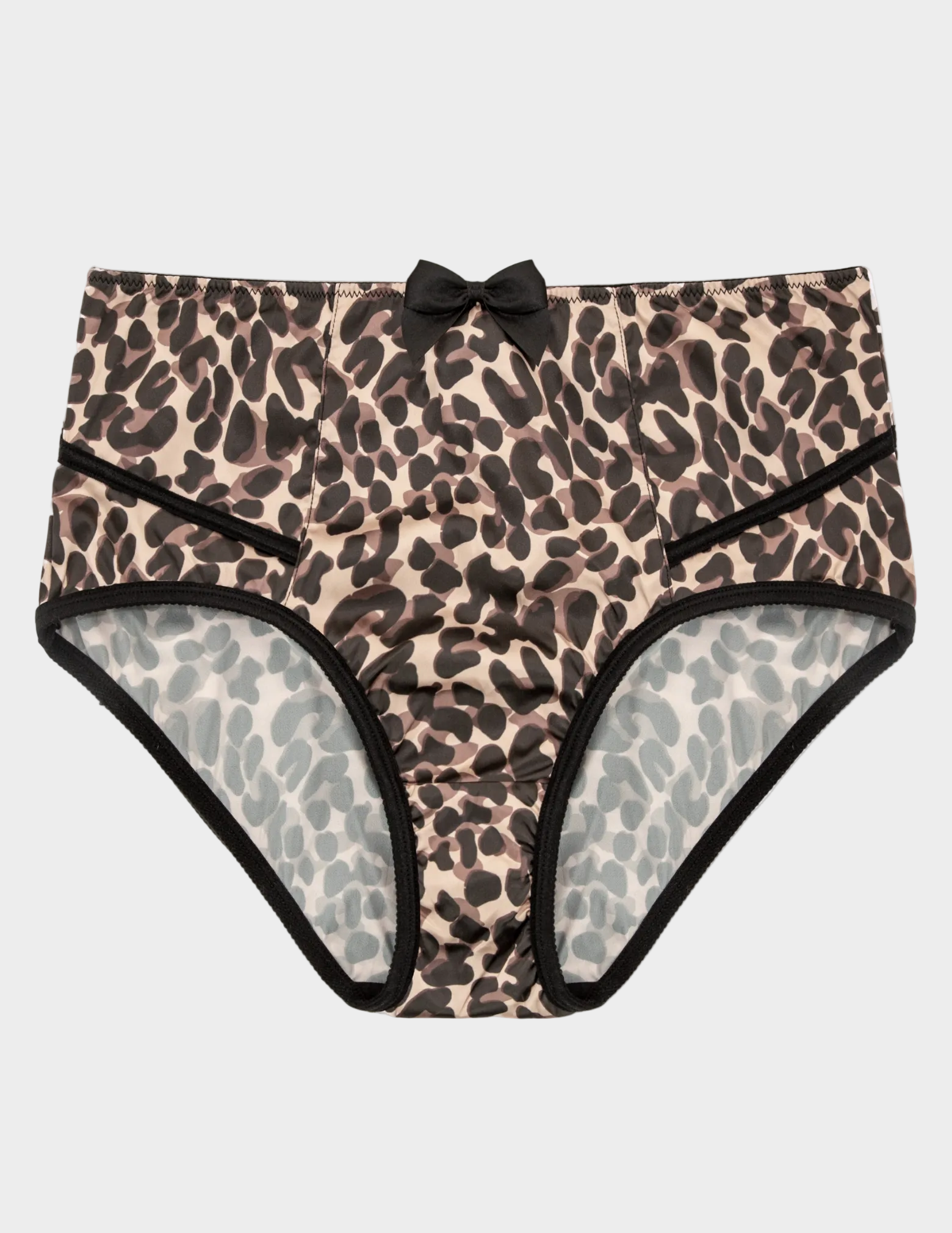 Leopard print underwear with a black bow and trim on a white background