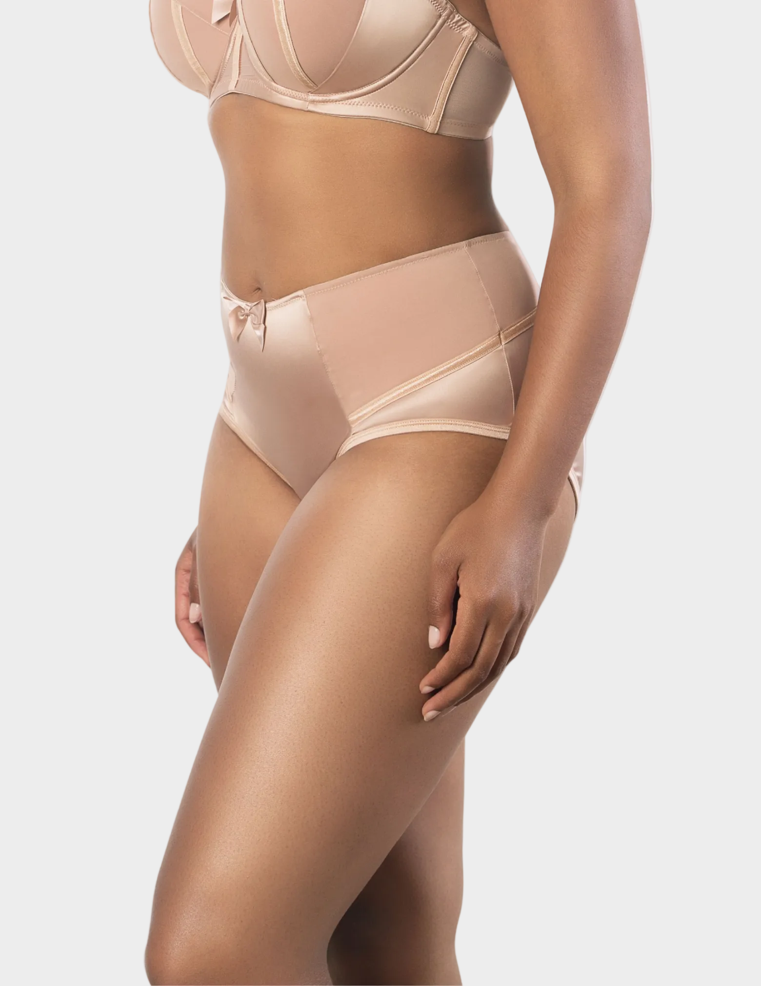 Side view of a model wearing Charlotte high waisted panty in True Nude