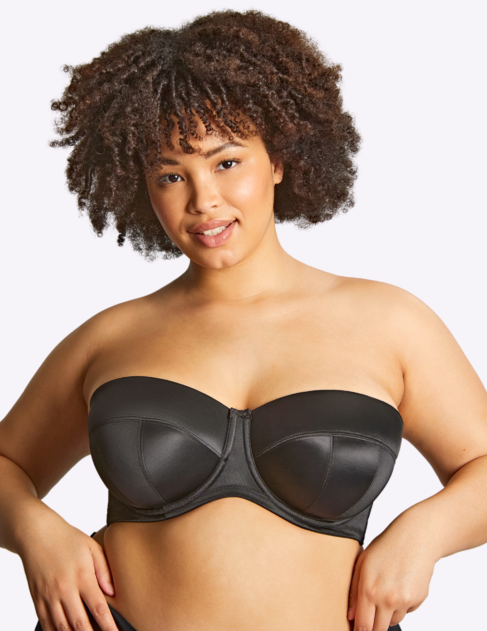 Front view of model wearing dana bra in black without straps