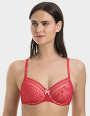 Woman wearing a red lace bra against a white background