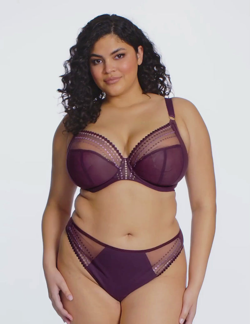 Model wearing Matilda thong in sugarplum posing and turning