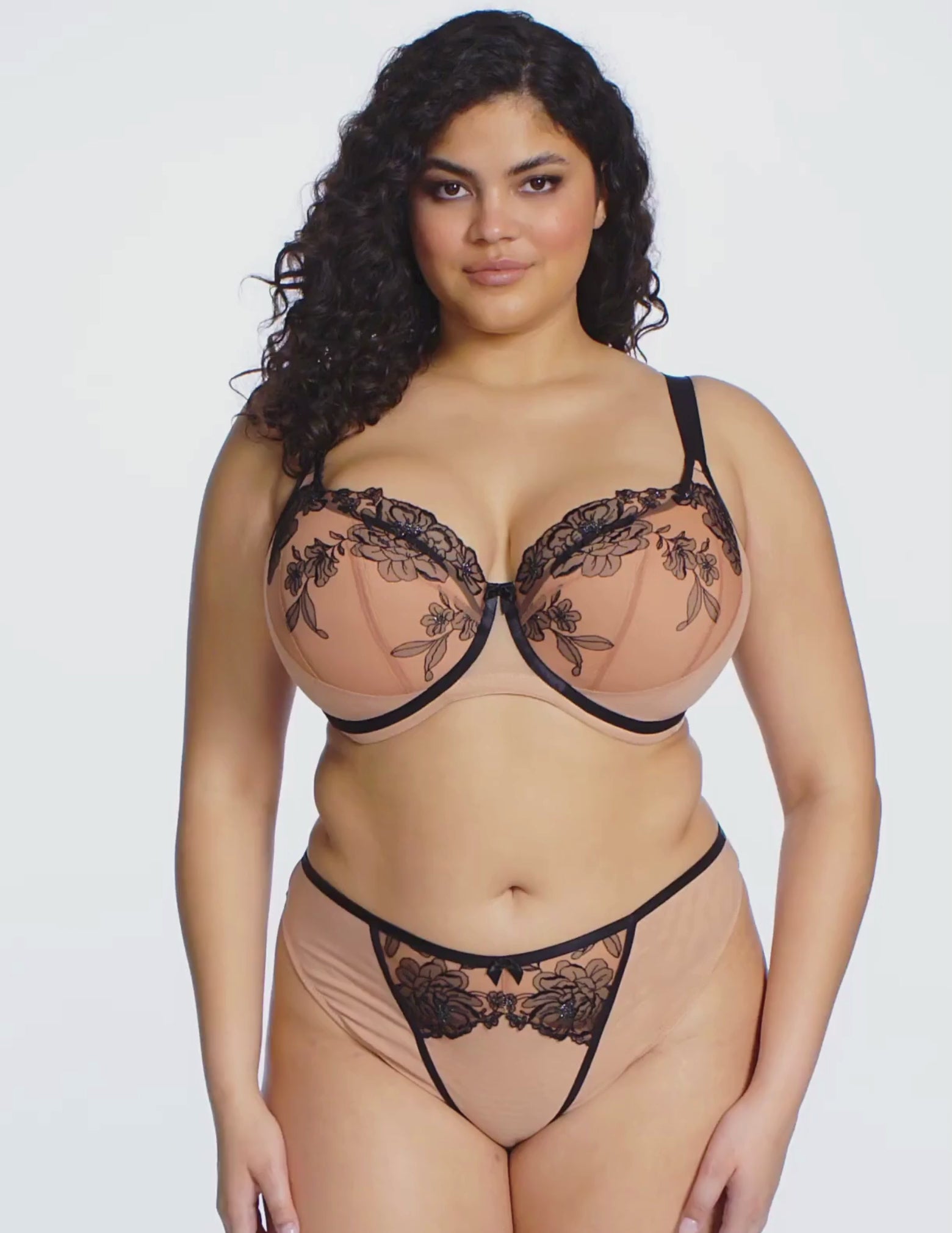 Load video: Model wearing Elomi Teagan bra in Café au Lait posing and turning