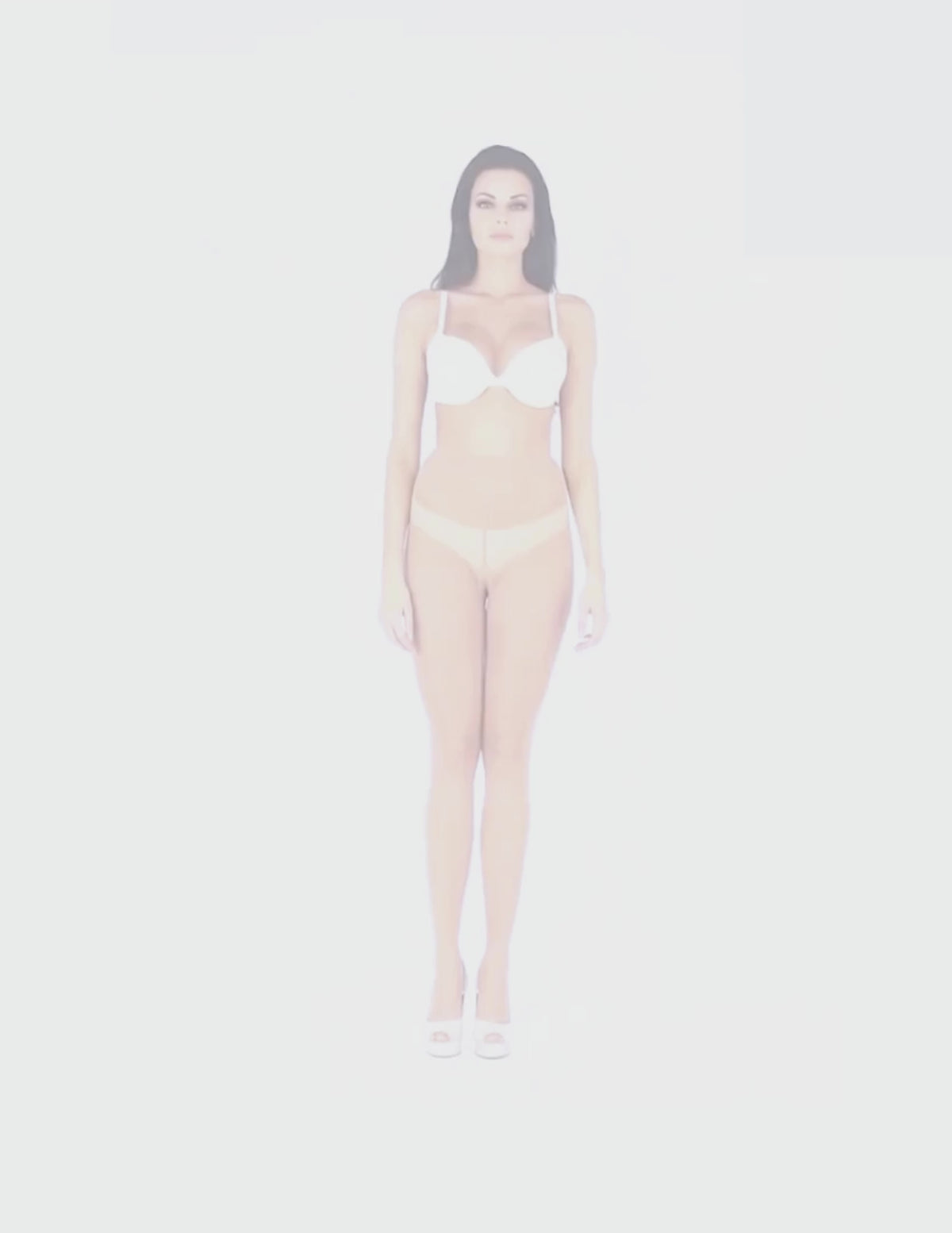 Load video: Model wearing Glamory Vital70 tights posing and turning