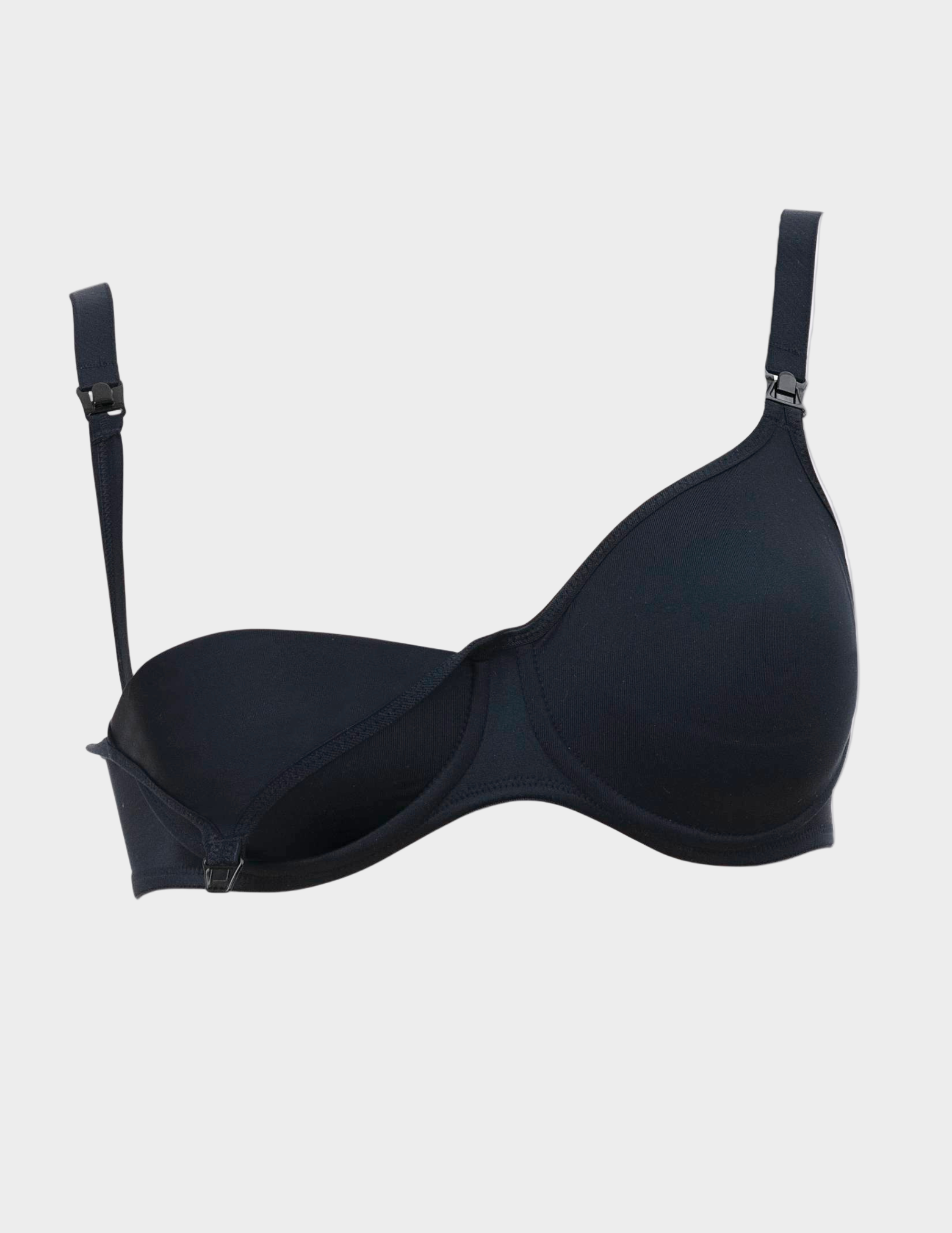 Black nursing bra unclipped on a white background
