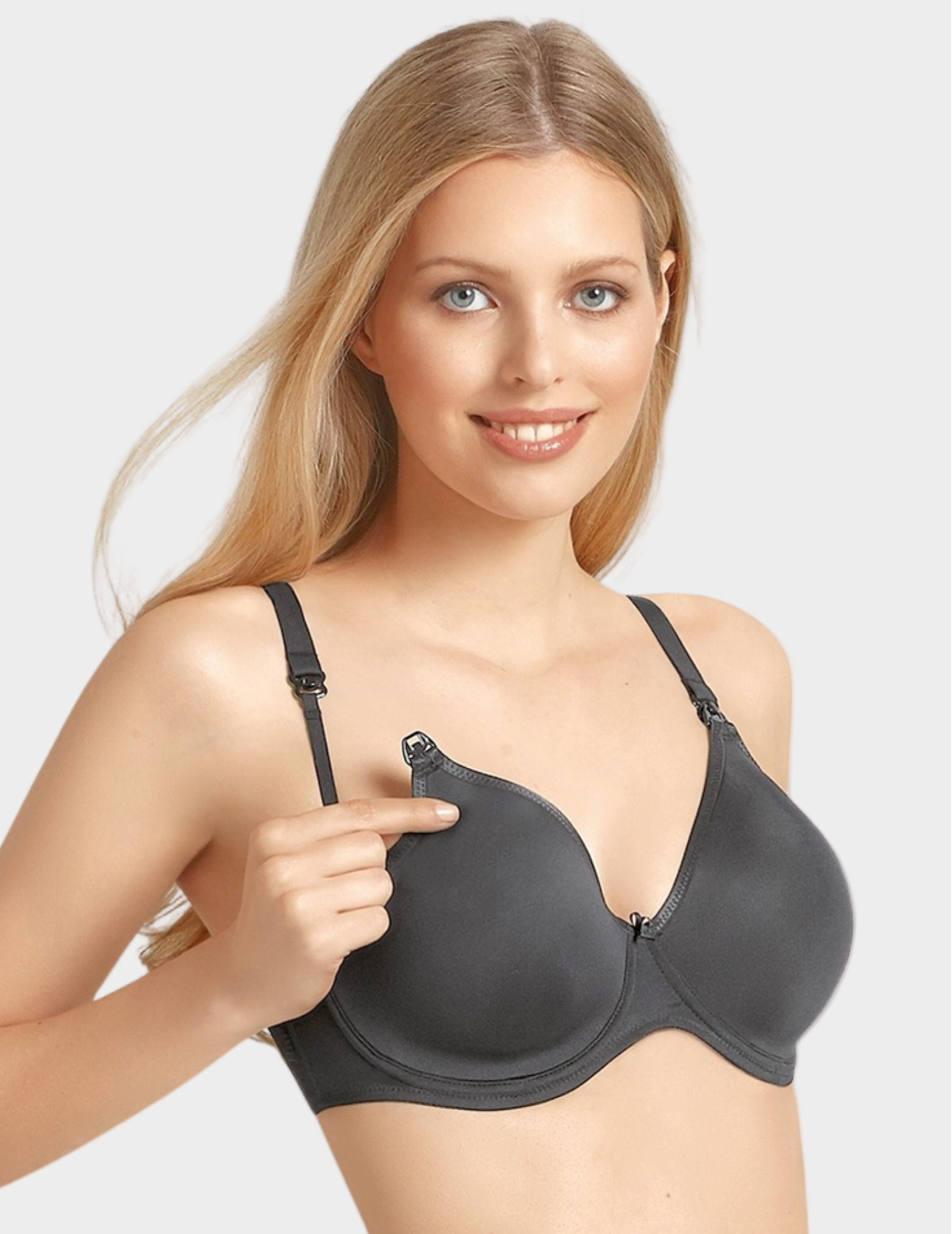 Woman wearing a black nursing bra on a white background