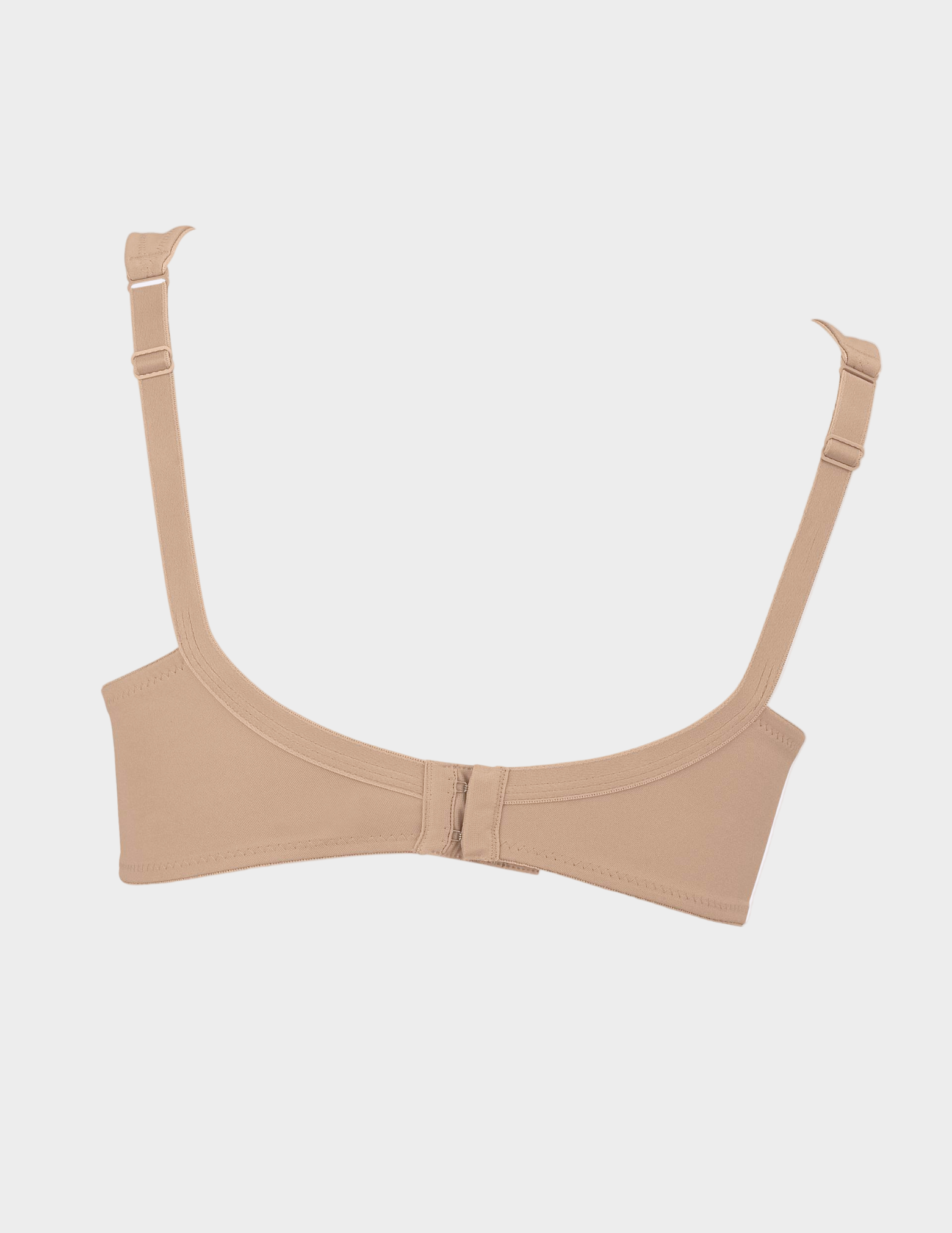 Beige bra on a white background